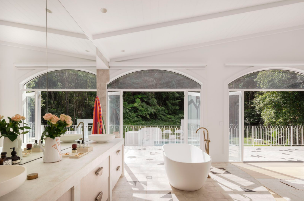 Homes on the market with bath tubs on the balconies.