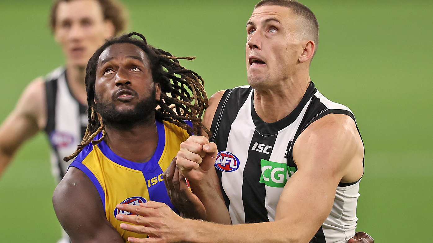 Nic Naitanui of the Eagles and Darcy Cameron of the Magpies