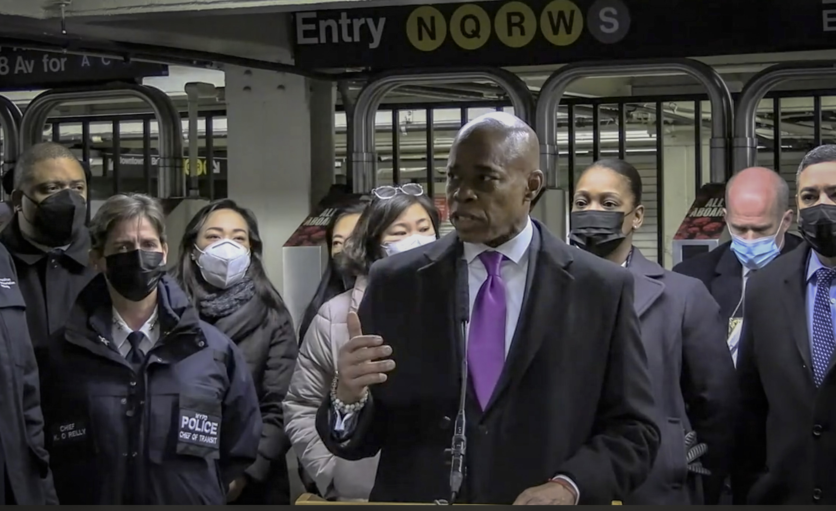 Mayor Eric Adams, with city law officials holding a press conference inside a subway station after a woman was pushed to her death in front of a subway train at the Times Square station.