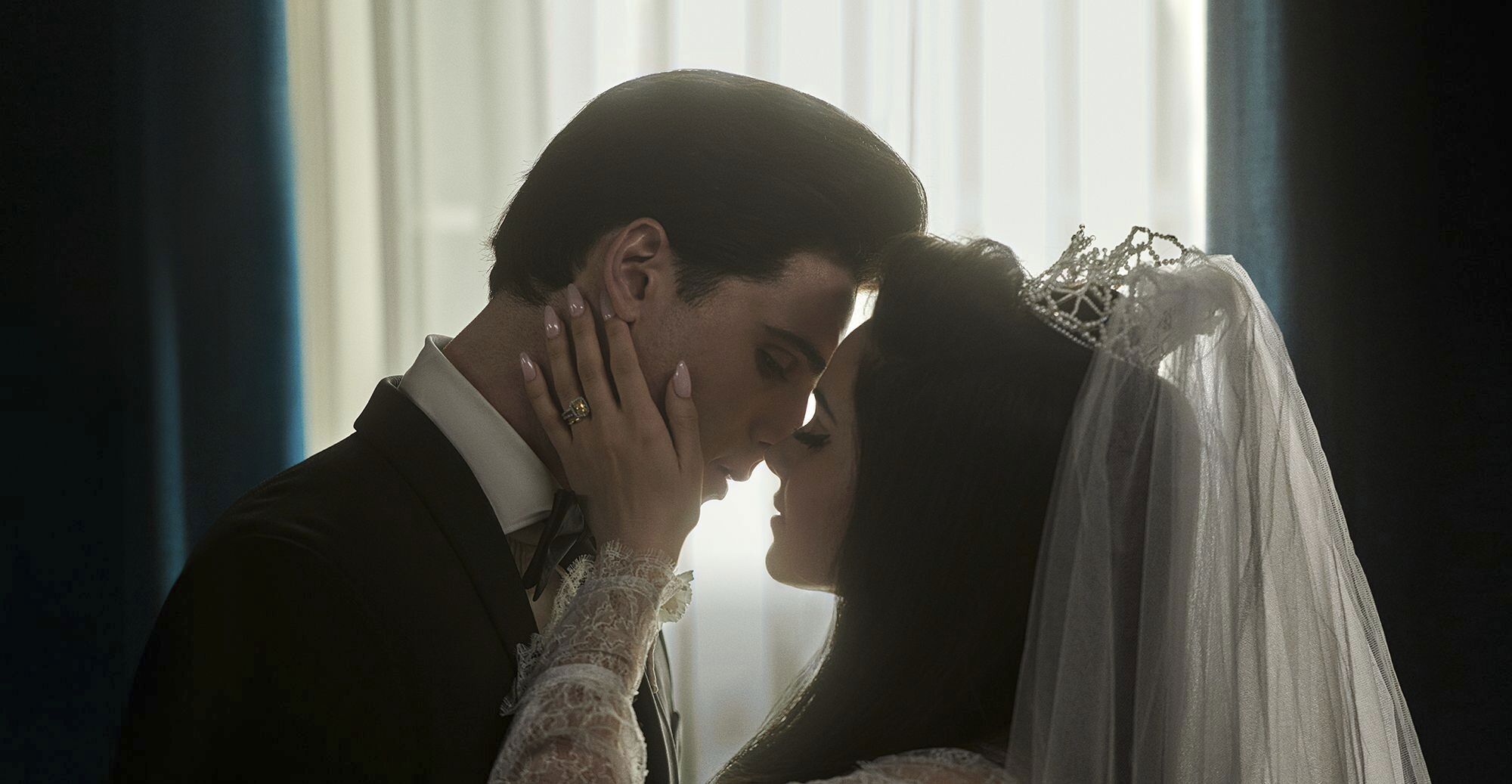 This image released by A24 shows Jacob Elordi as Elvis, left, and Cailee Spaeny as Priscilla, in a scene from "Priscilla."