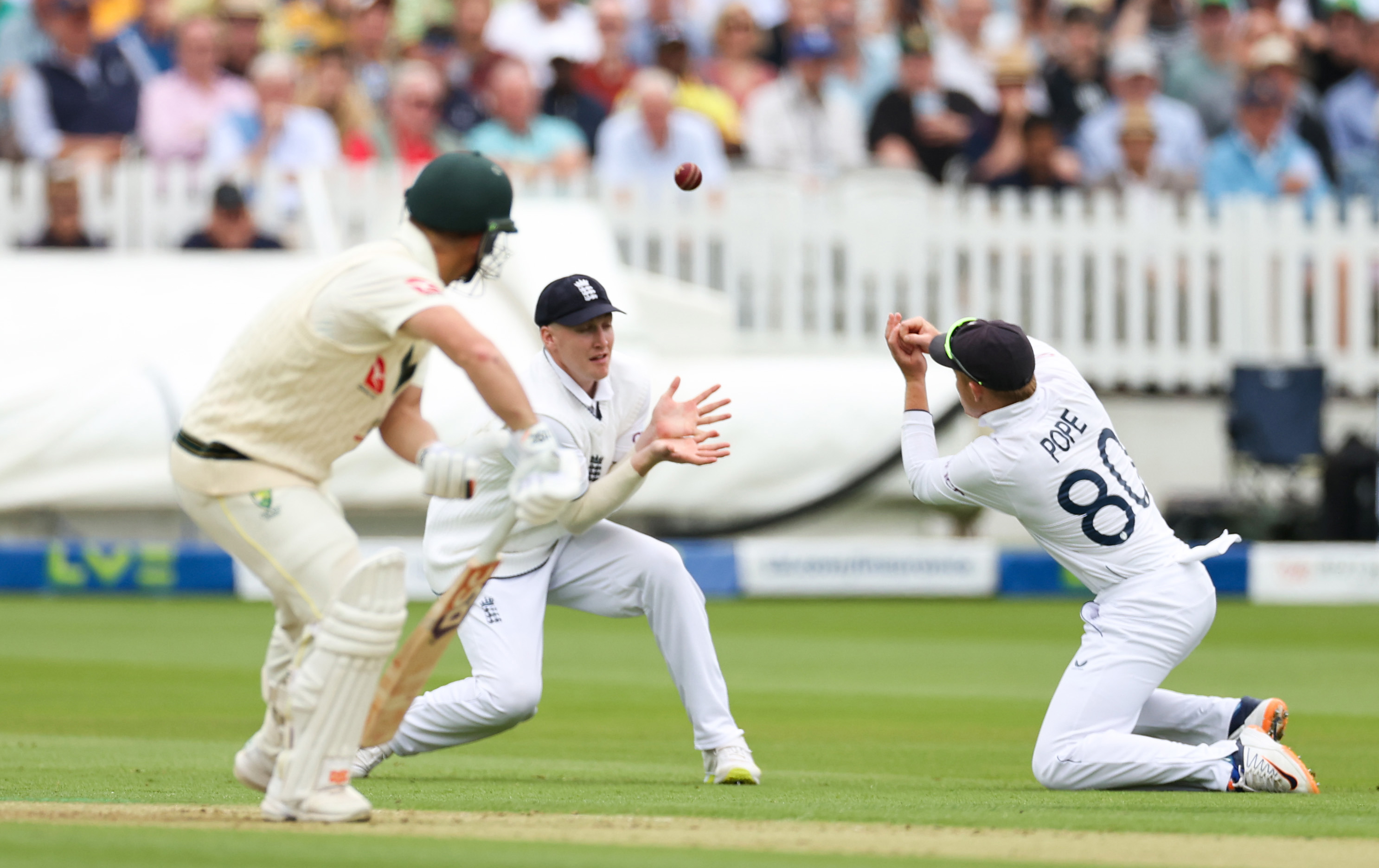 Ollie Pope drops David Warner off the bowling of Stuart Broad during day one of the second Ashes Test at Lord's.