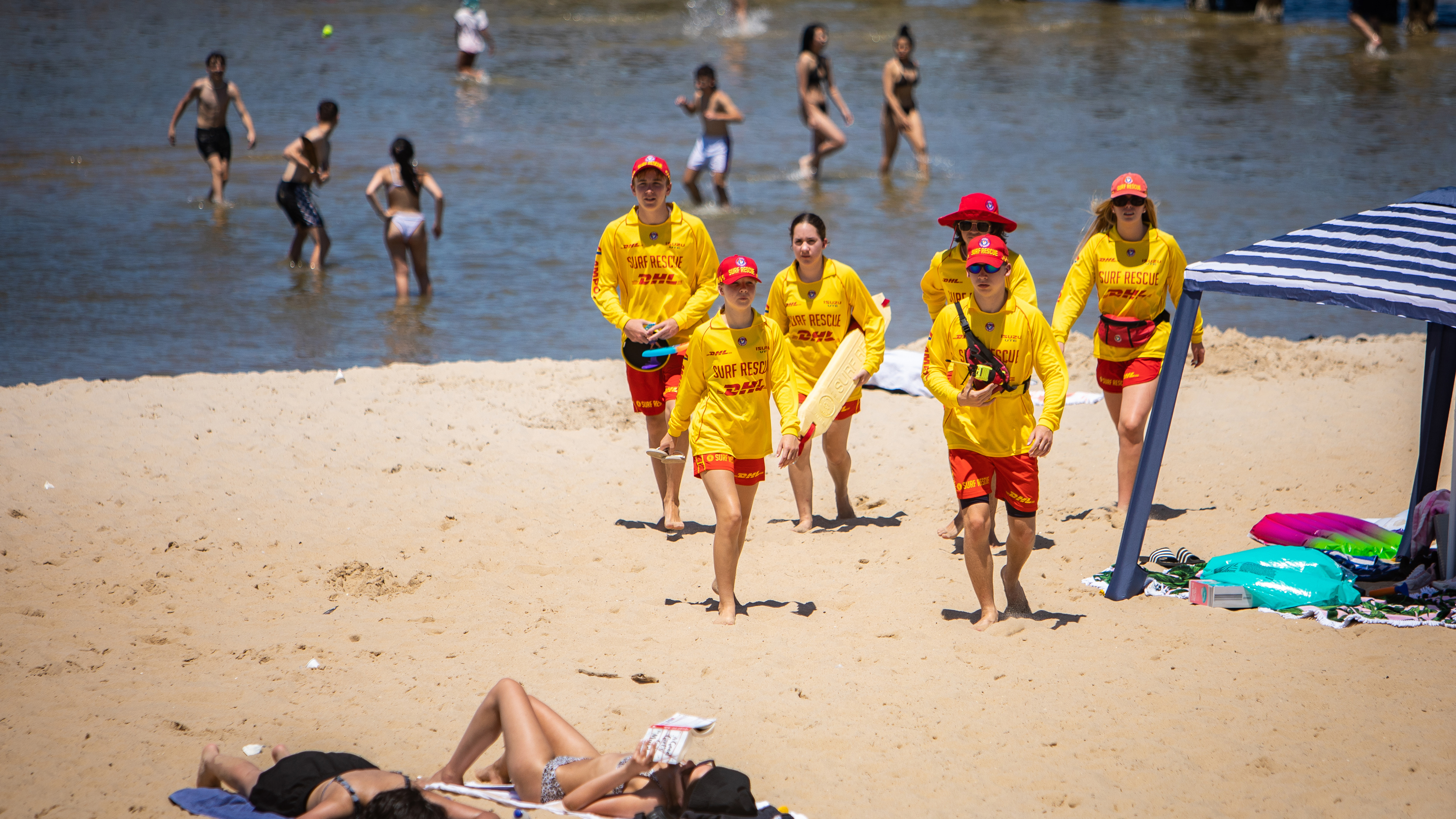 Altona Lifesaving Club members patrolling on Altona beach in Victoria.