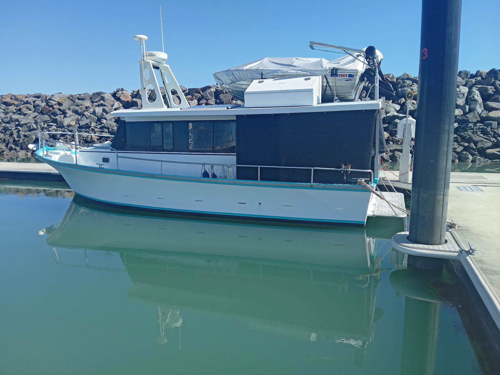 A Queensland couple were rescued by a fisherman after being stranded out at sea on paddleboards for three days.