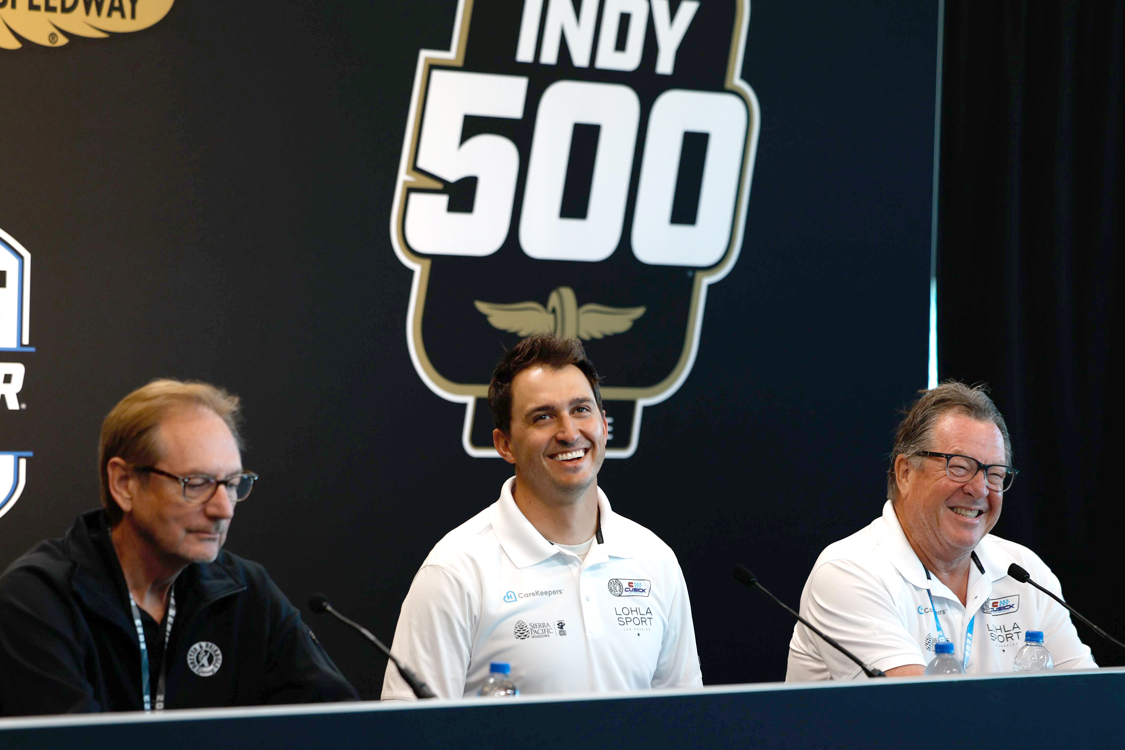 Team owner Dennis Reinbold (left) with Graham Rahal (centre) and Don Cusik (right).
