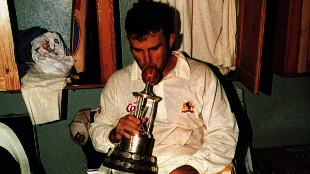 Mark Taylor celebrates with the Frank Worrell trophy.