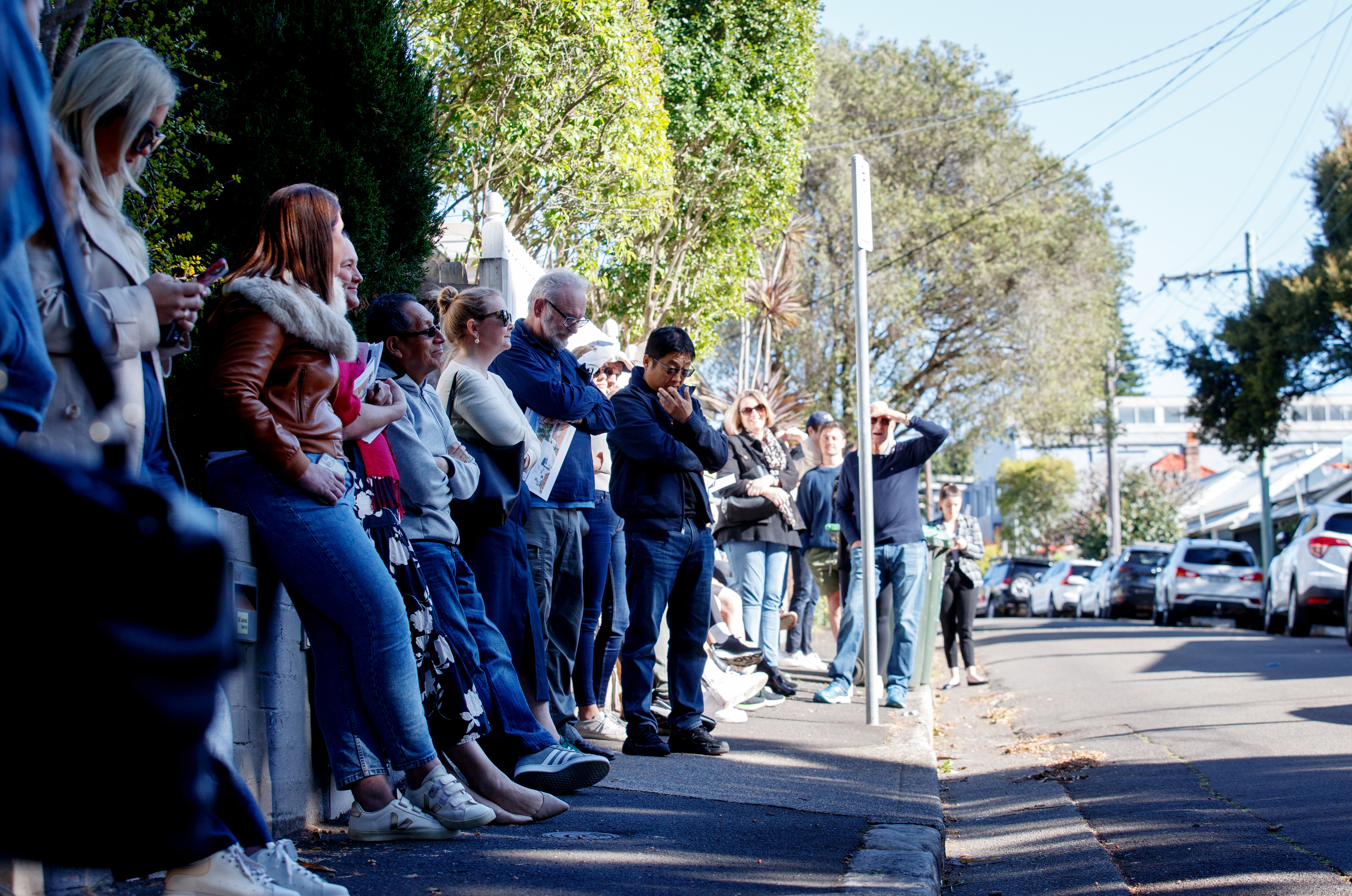 Potential bidders attend an auction