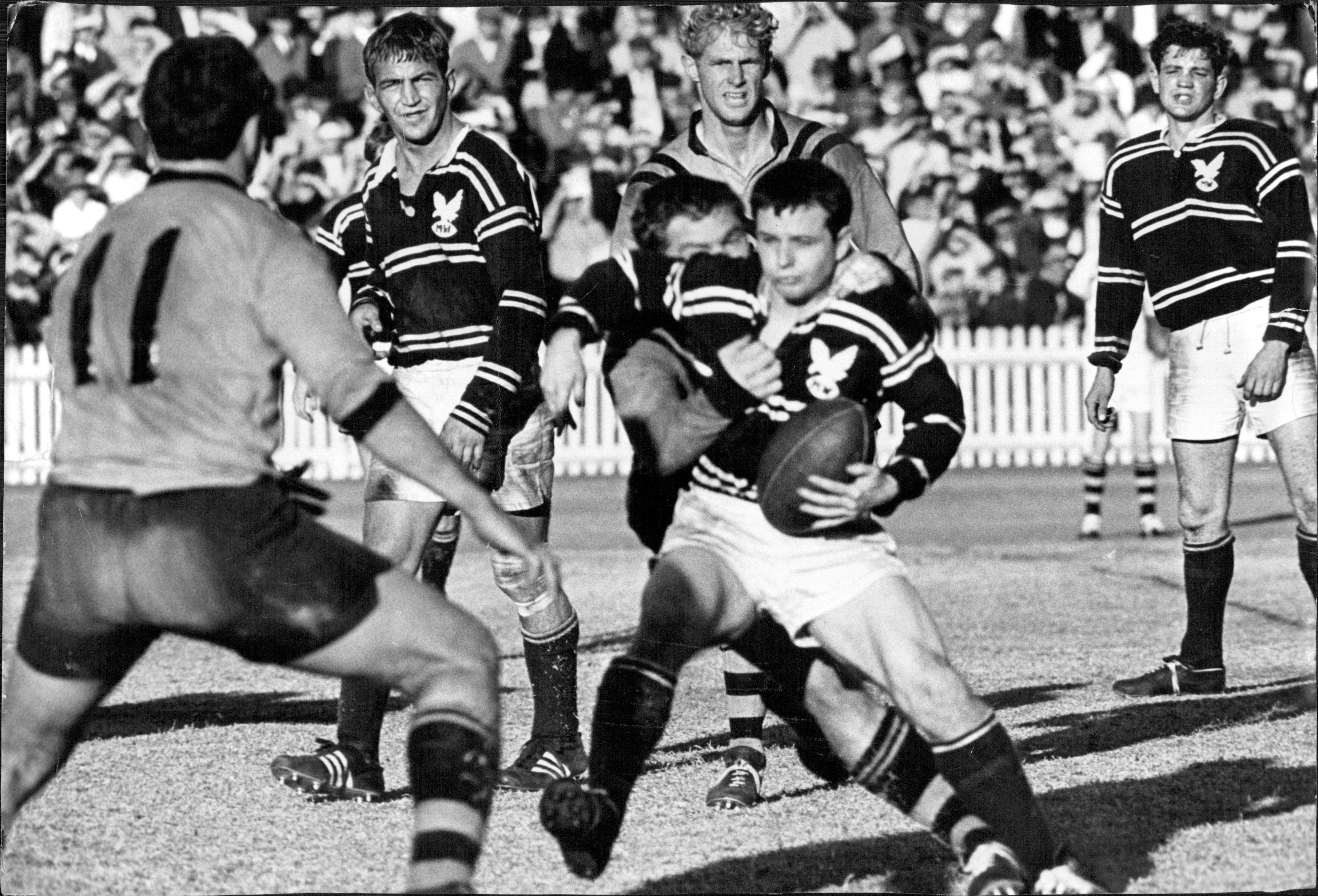 One occasion when Dennis Ward didn't get away. He's caught - ball and all. September 6, 1968.