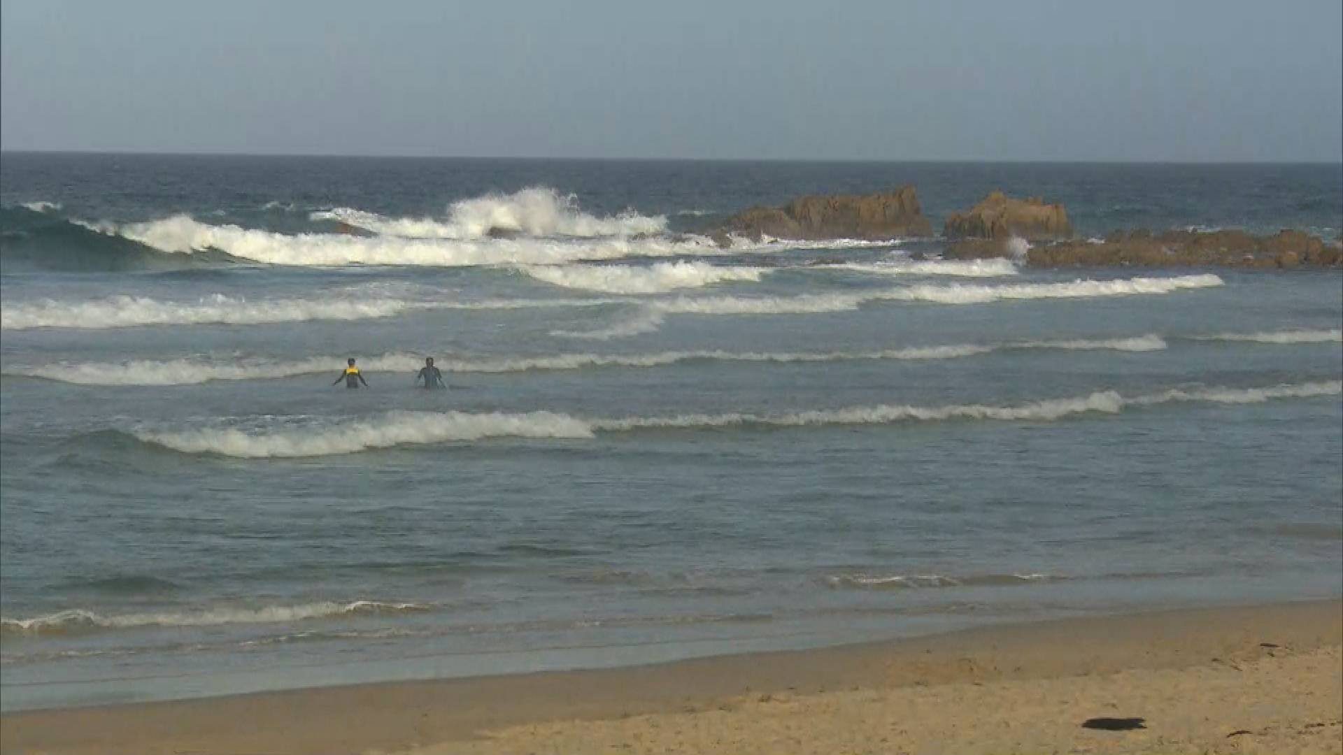 An off-duty police officer has drowned while trying to save a teenage boy from a rip on a beach south of Sydney.While the 14-year-old survived, the man, 45, died after the brave rescue at Narooma, on the NSW Far South Coast, on New Year's Day.