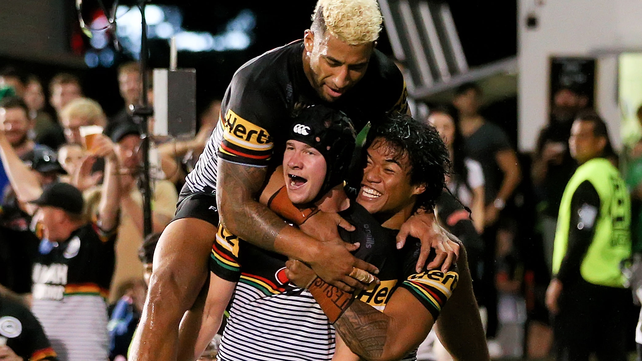 Matt Burton celebrates with the Panthers after scoring.