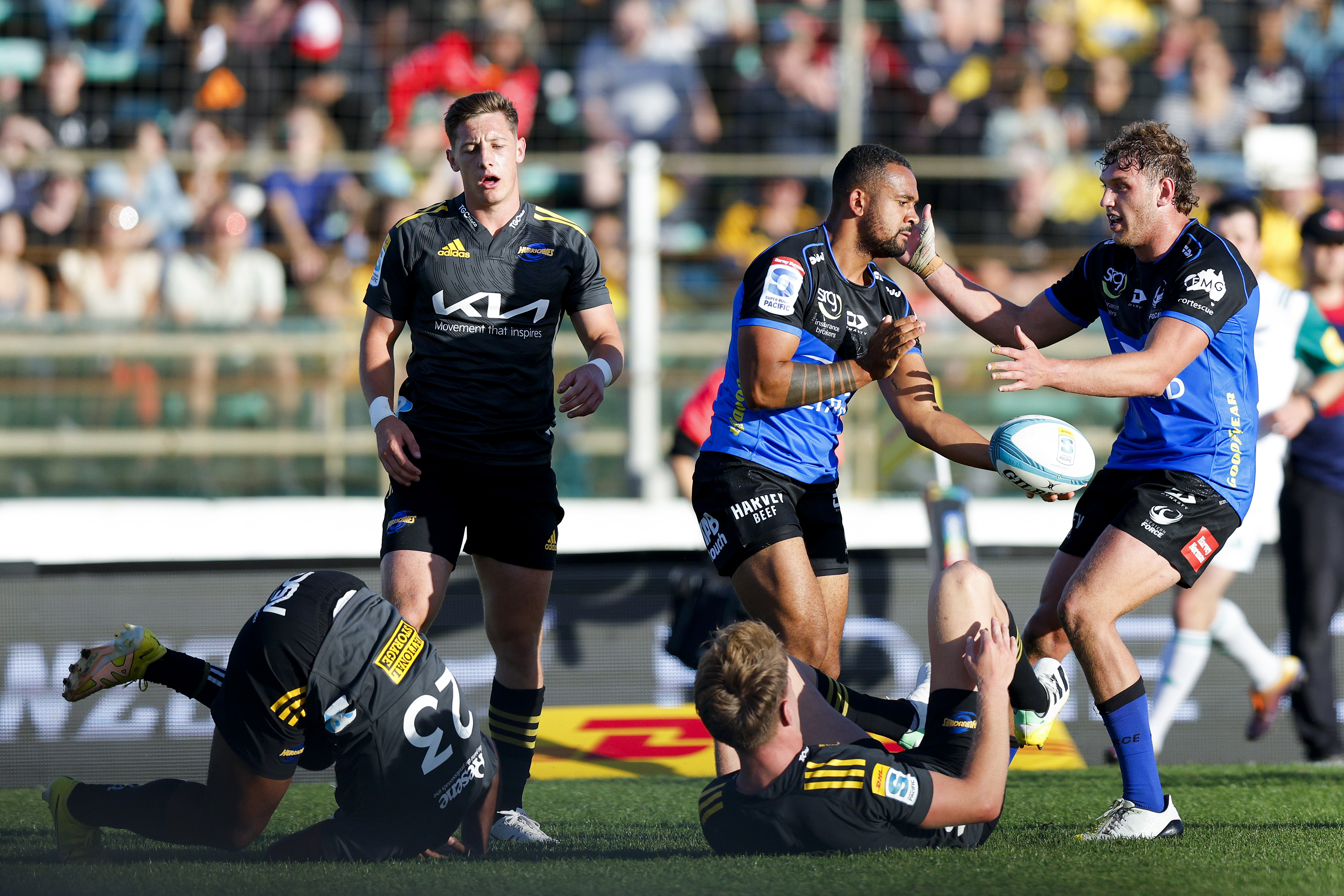 Zach Kibirige of the Force celebrates with Bayley Kuenzle after scoring a try.