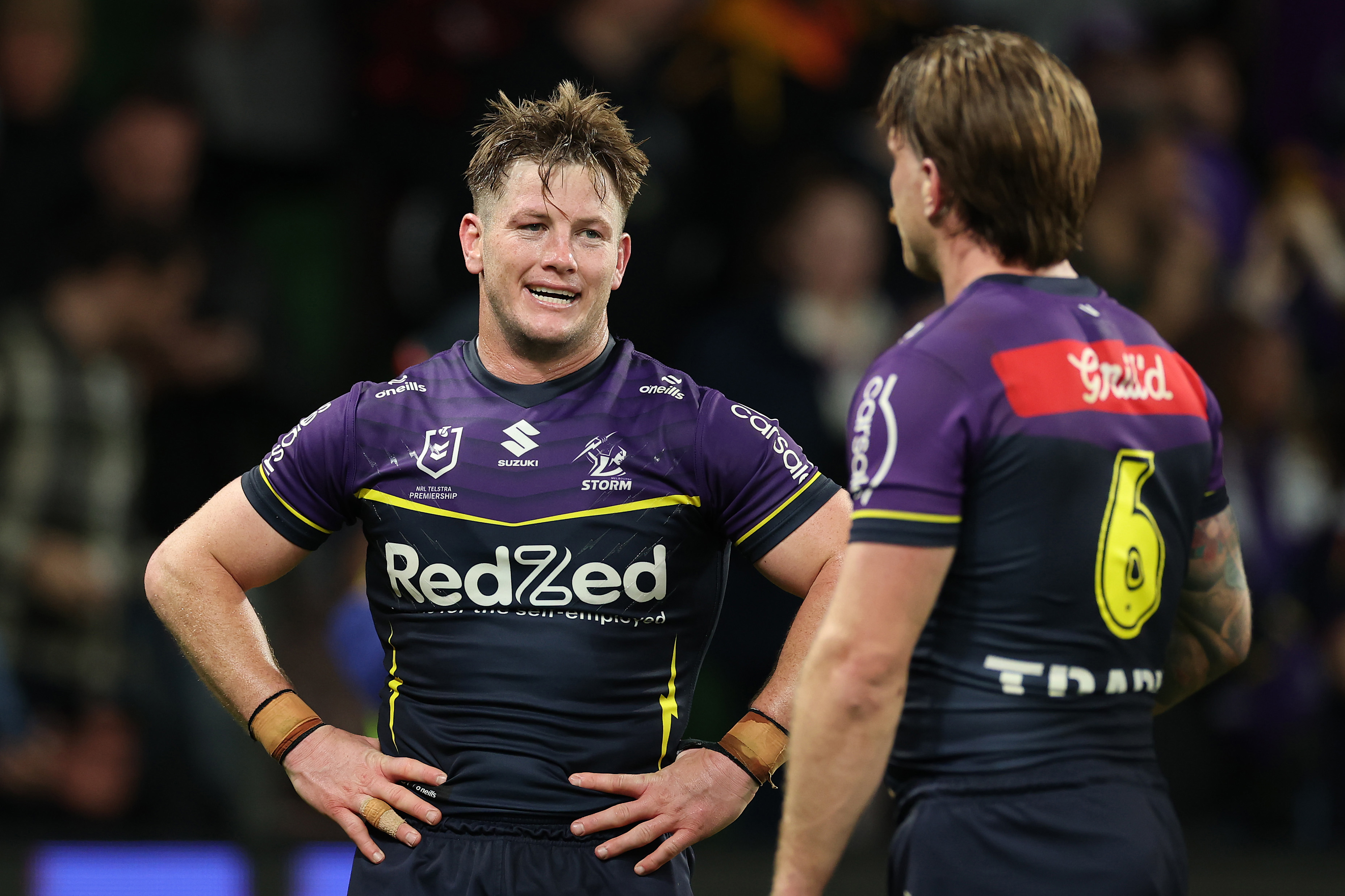 MELBOURNE, AUSTRALIA - SEPTEMBER 26: Harry Grant and Cameron Munster of the Storm celebrate winning the NRL Preliminary Final match between the Melbourne Storm and Cronulla Sharks at AAMI Park on September 26, 2025, in Melbourne, Australia. (Photo by Cameron Spencer/Getty Images)