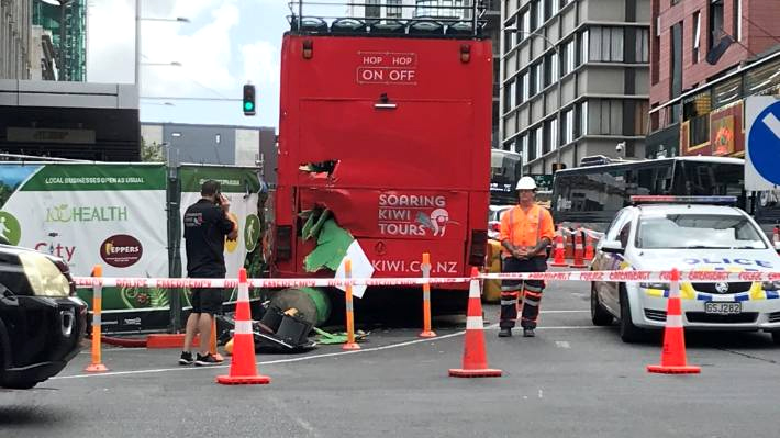 A man with a Soaring Kiwi Tours polo shirt was behind the cordon looking at the bus from various angles on Monday afternoon.