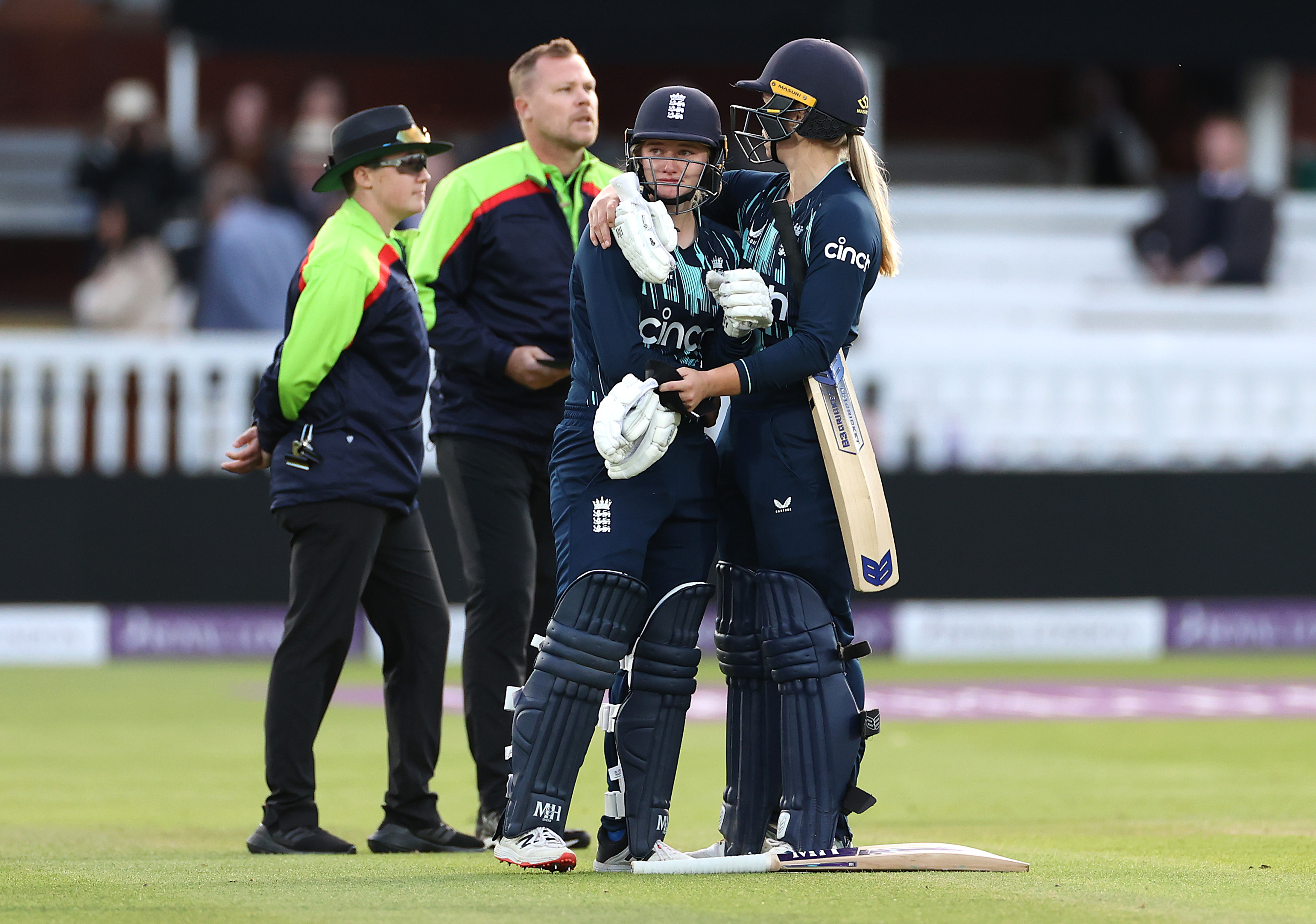 Charlie Dean of England is consoled by Freya Davies of England after Dean was run out Deepti Sharma of India to claim victory during the 3rd Royal London ODI between England Women and India Women at Lord's Cricket Ground on September 24, 2022 in London, England. (Photo by Ryan Pierse/Getty Images)