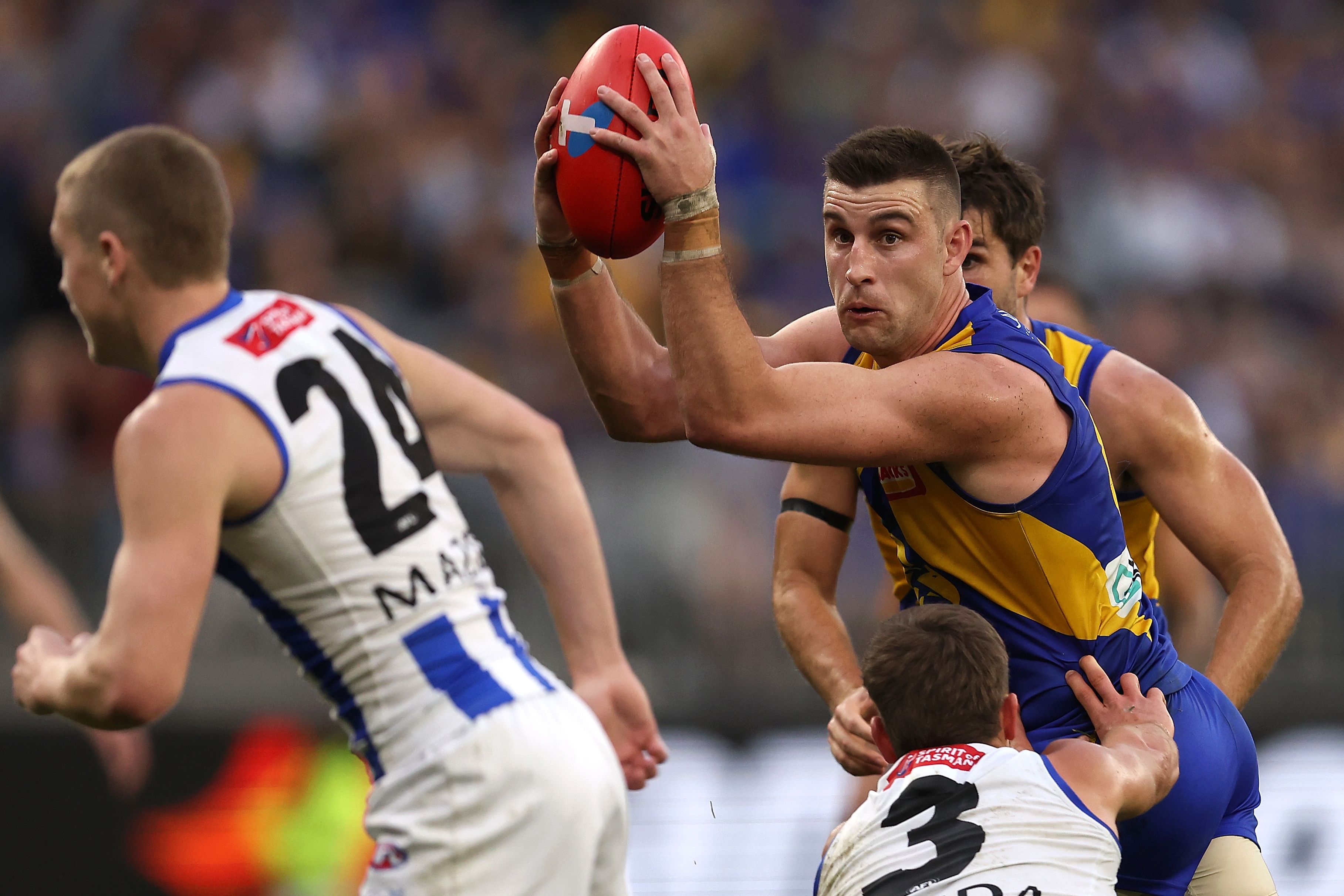 Elliot Yeo of the West Coast Eagles looks for support in traffic.