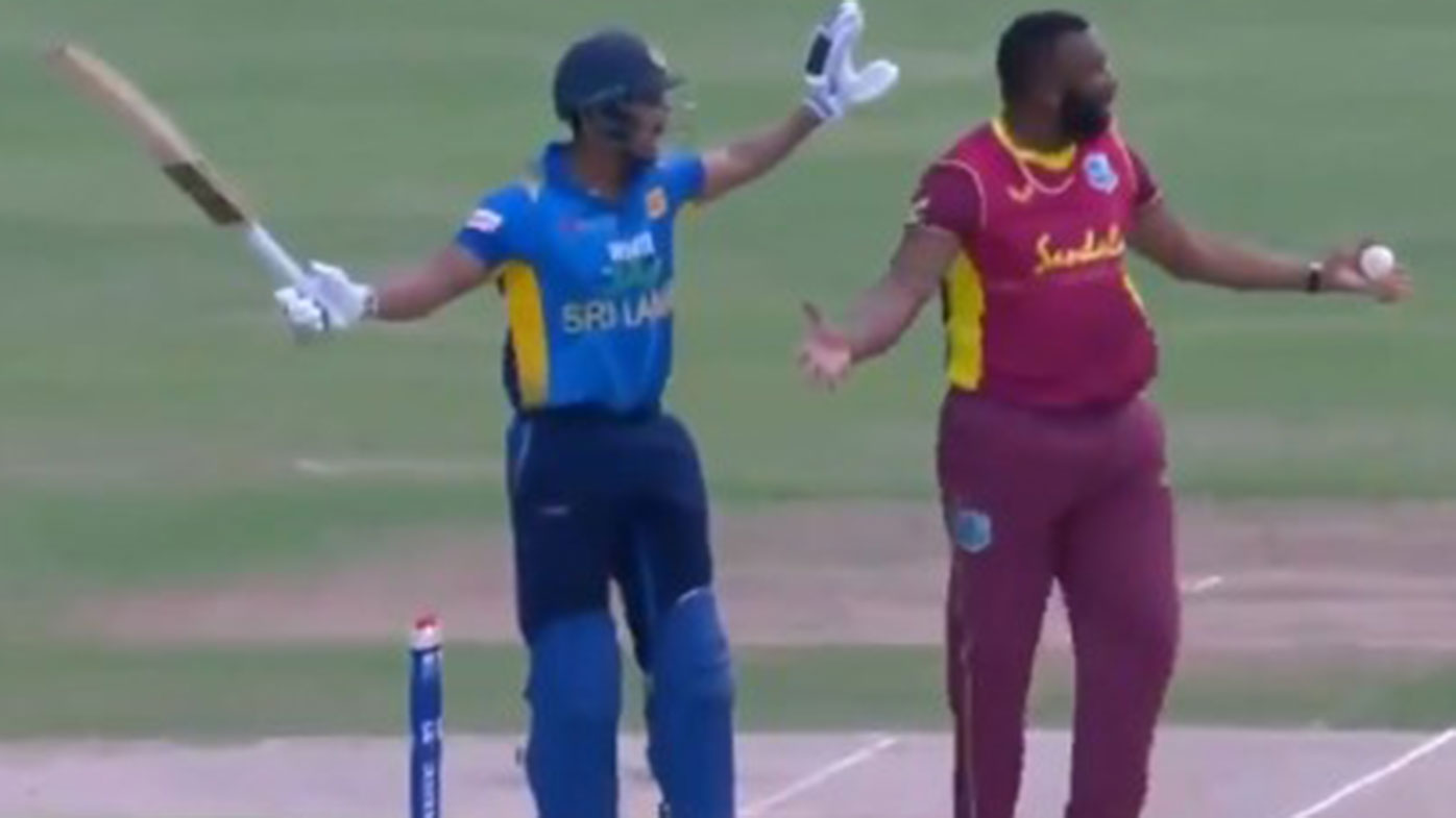 Danushka Gunathilaka and Kieron Pollard after Pollard accused Gunathilaka of obstructing the field.