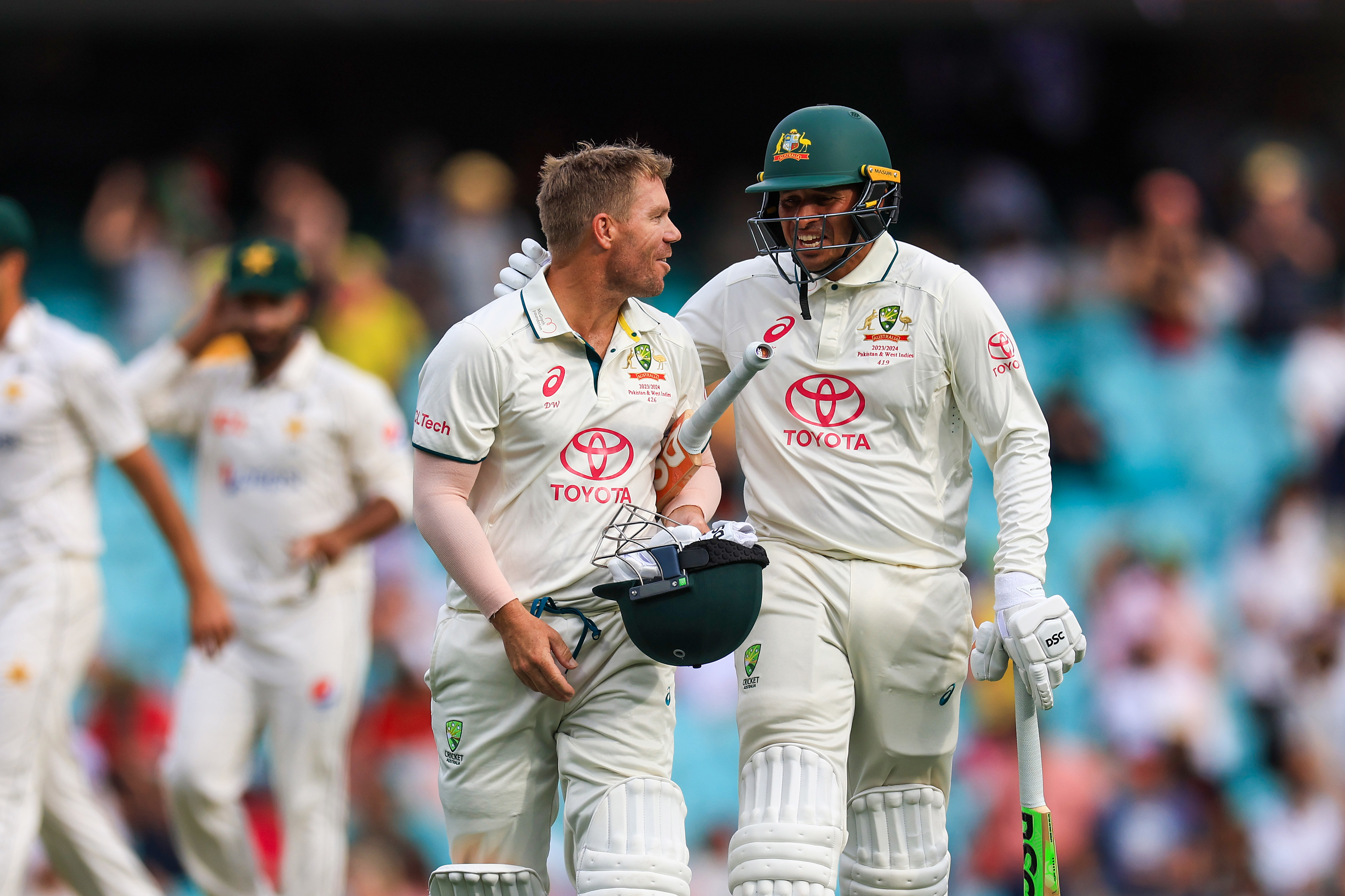 David Warner of Australia (L) and Usman Khawaja of Australia leave the field after day one of the Men's Third Test Match in the series between Australia and Pakistan at Sydney Cricket Ground on January 03, 2024 in Sydney, Australia. (Photo by Mark Evans/Getty Images)