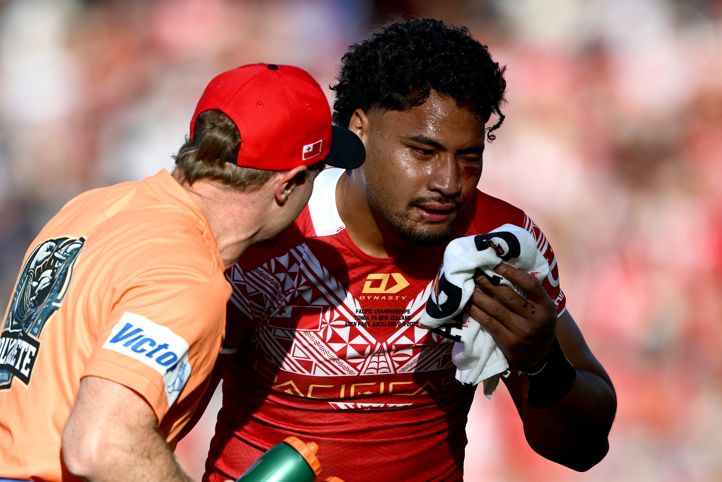 AUCKLAND, NEW ZEALAND - NOVEMBER 02: Eliesa Katoa of Tonga is attended to by a trainer during the Men's Pacific Championships match between the New Zealand Kiwis and Tonga at Eden Park on November 02, 2025 in Auckland, New Zealand. (Photo by Hannah Peters/Getty Images)