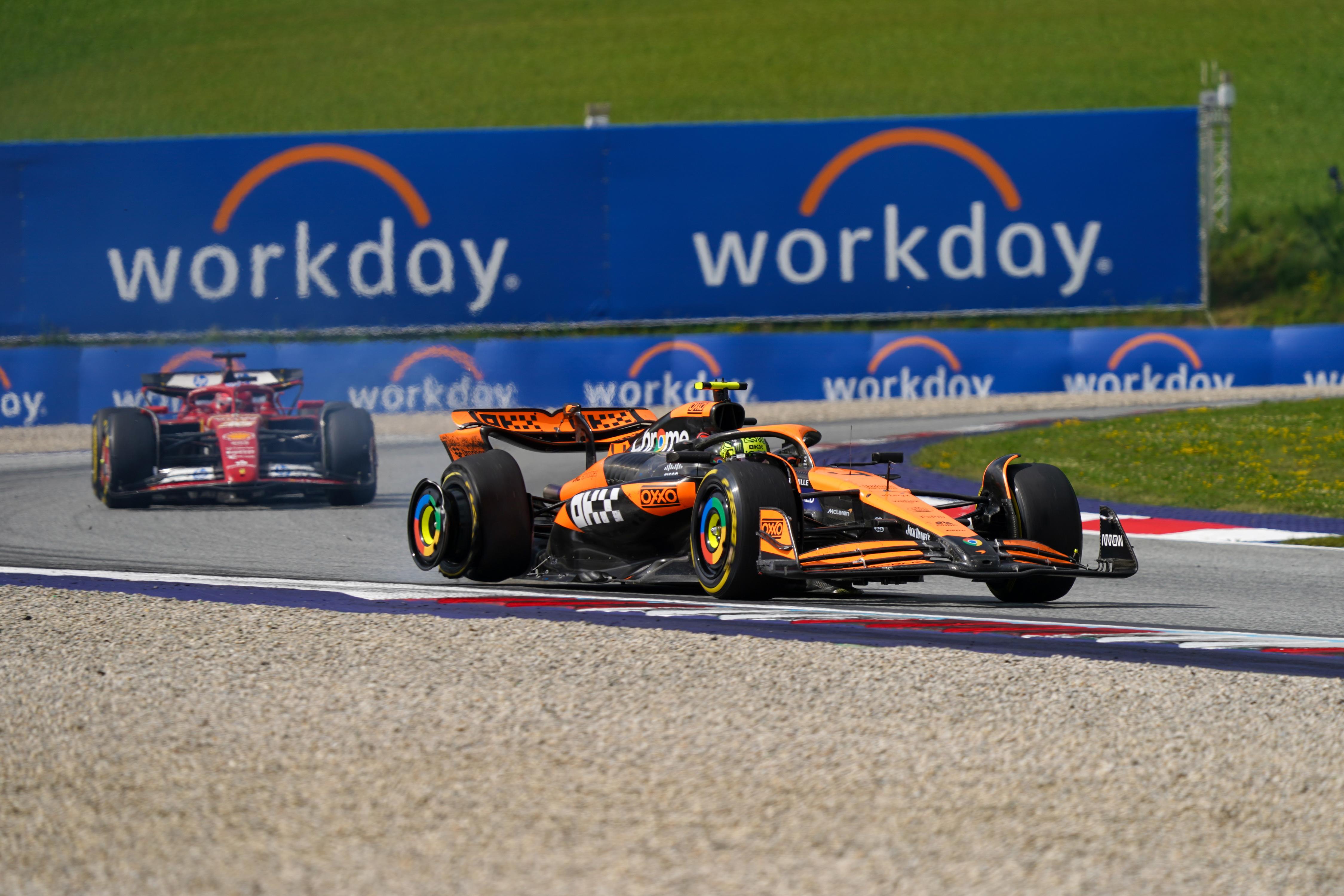 Lando Norris of the UK is driving the (4) McLaren F1 Team MCL38 Mercedes with a damaged tyre after contact with Max Verstappen of the Netherlands, who is driving the (1) Oracle Red Bull Racing RB20 Honda RBPT during the Formula 1 Qatar Airways Austrian Grand Prix in Spielberg, Austria, on June 30, 2024. (Photo by Alessio Morgese/NurPhoto)