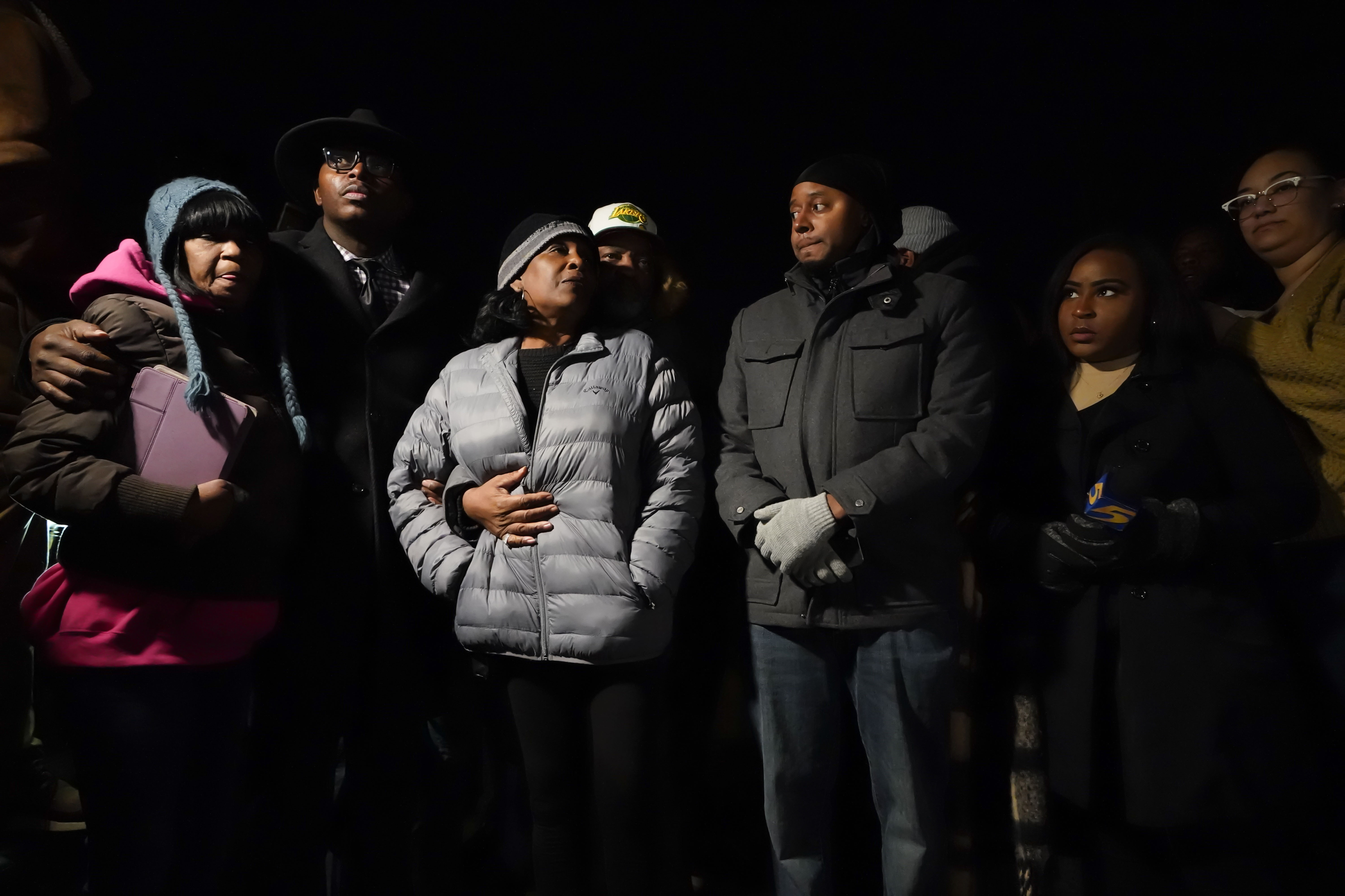 RowVaughn Wells, center, mother of Tyre Nichols, who died after being beaten by Memphis police officers, is comforted by his stepfather Rodney Wells, at the conclusion of a candlelight vigil for Tyre, in Memphis, Tenn., Thursday, Jan. 26, 2023 