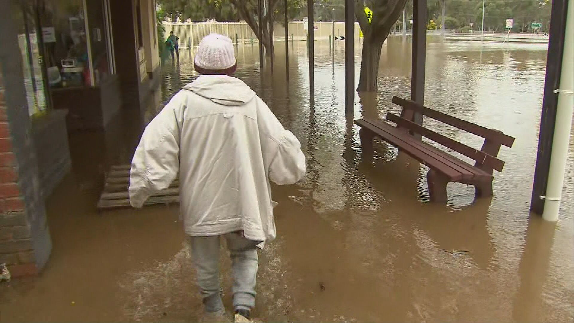 Woman trapped in Rochester floodwaters reunited with dying dog. Victoria floods.