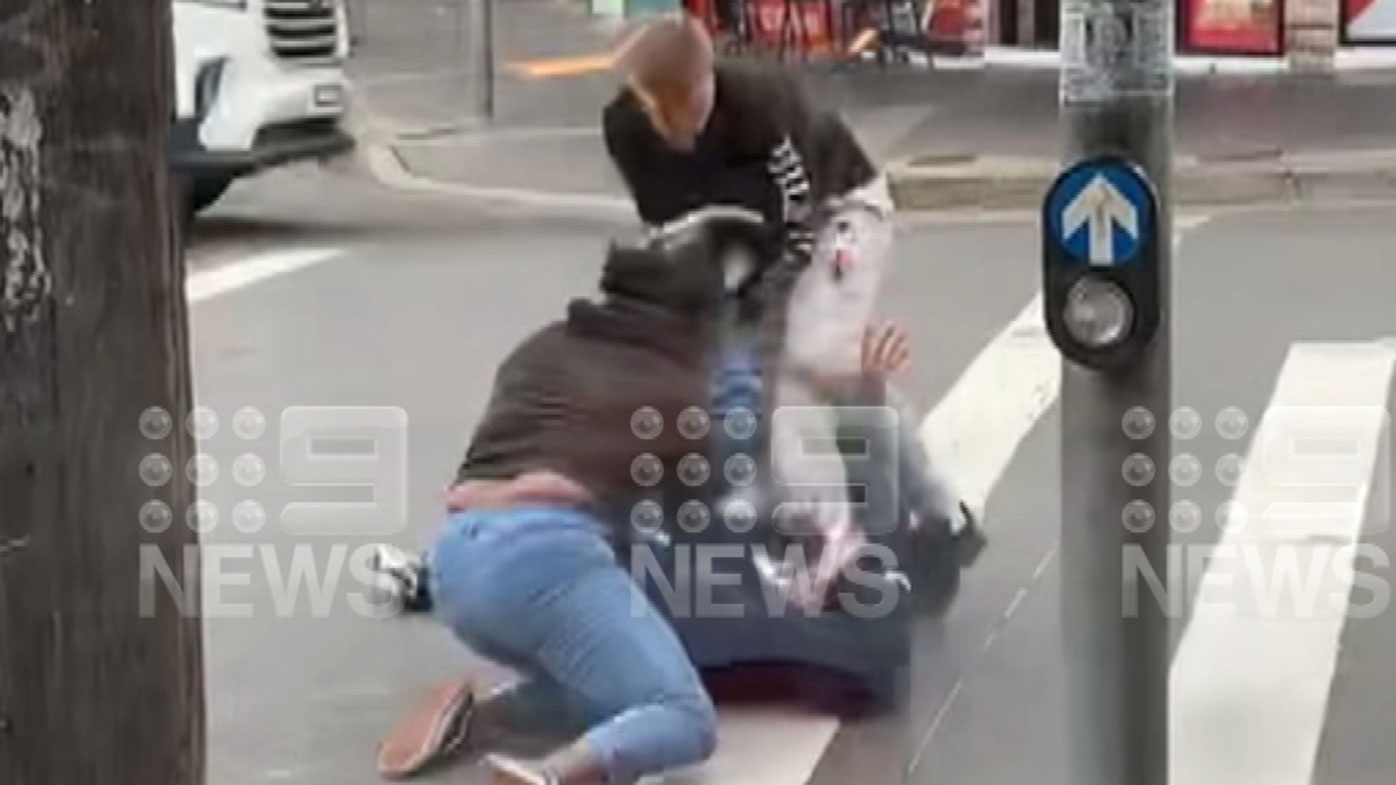 The brawl spilled out onto the road itself.