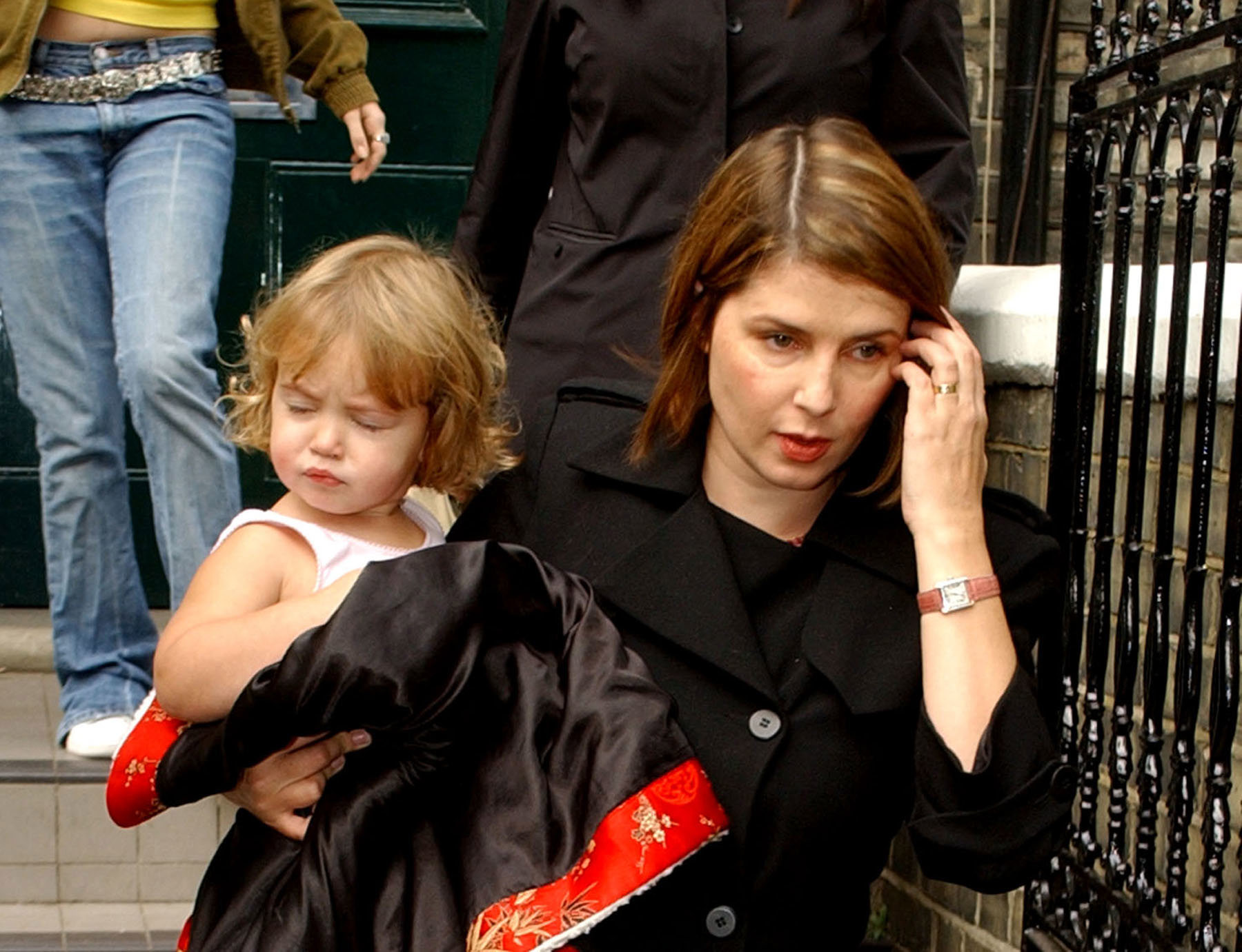 Sadie Frost and daughter Iris Law leave their home in Primrose Hill, London, in 2002 after the two-year-old swallowed part of an ecstacy tablet at a children's party inside a West End private member's club.   
