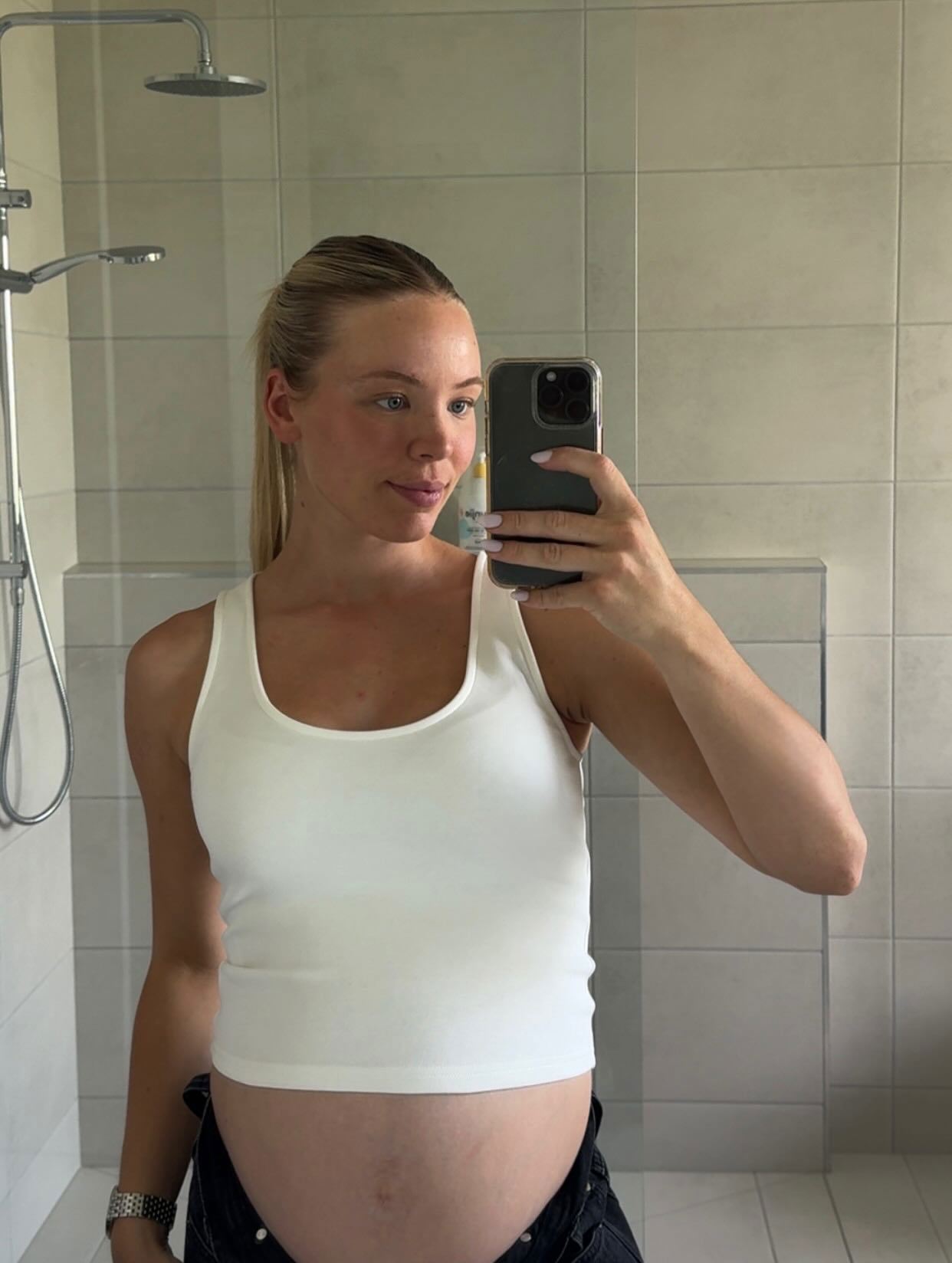 Georgia Devlin shares a bump photo during her third pregnancy 