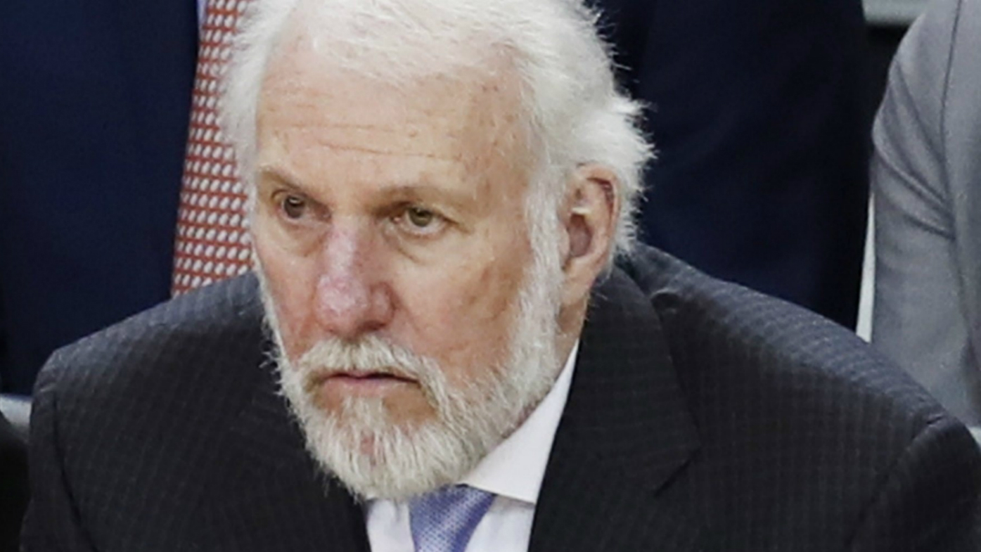 San Antonio Spurs head coach Gregg Popovich (C) sits on the bench late in the fourth quarter of the NBA Western Conference First Round Playoffs