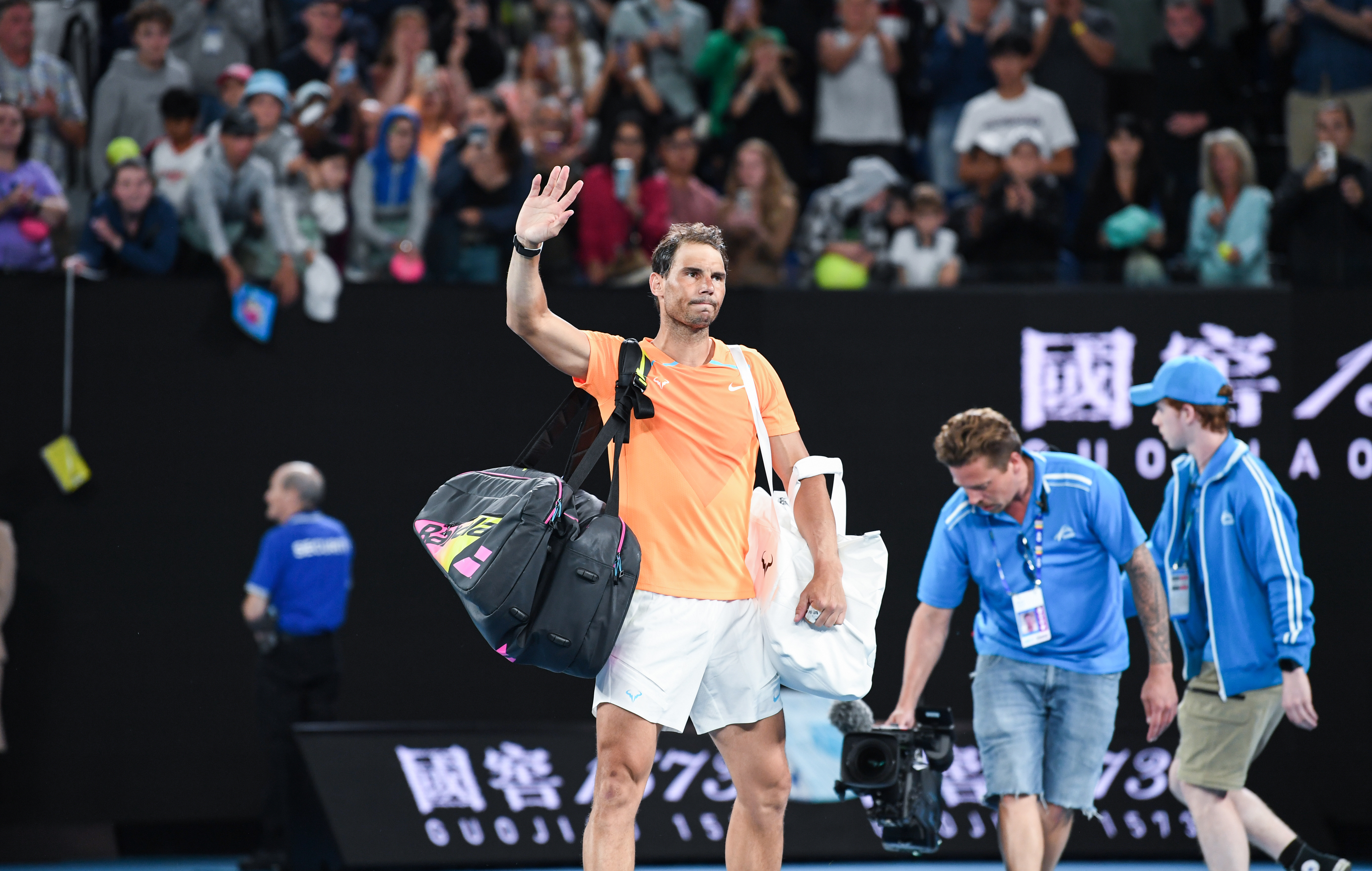 Rafael Nadal of Spain waves goodbye to the crowd on Rod Laver Arena after losing against Mackenzie McDonald of the United States. (Photo by James D. Morgan/Getty Images)