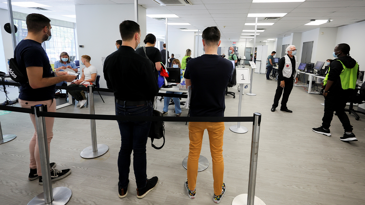 People wait in line at a monkeypox vaccination clinic run by CIUSSS public health authorities in Montreal, Quebec, Canada, June 6, 2022. 