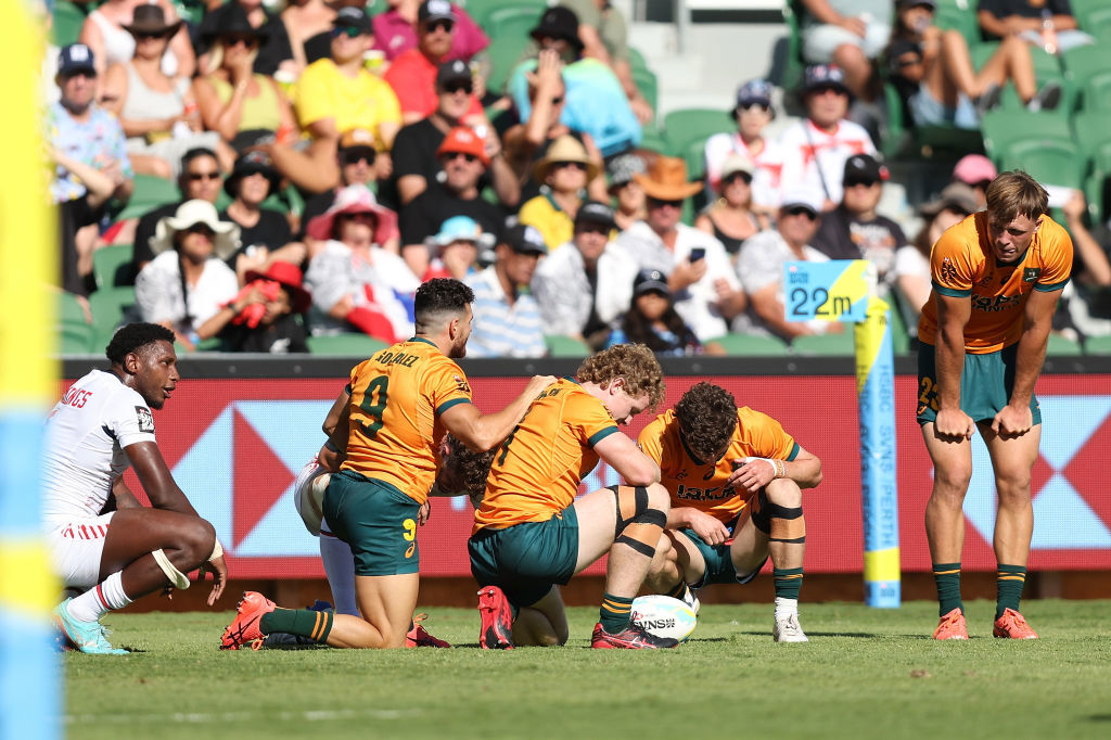 Australia players react following the final siren.