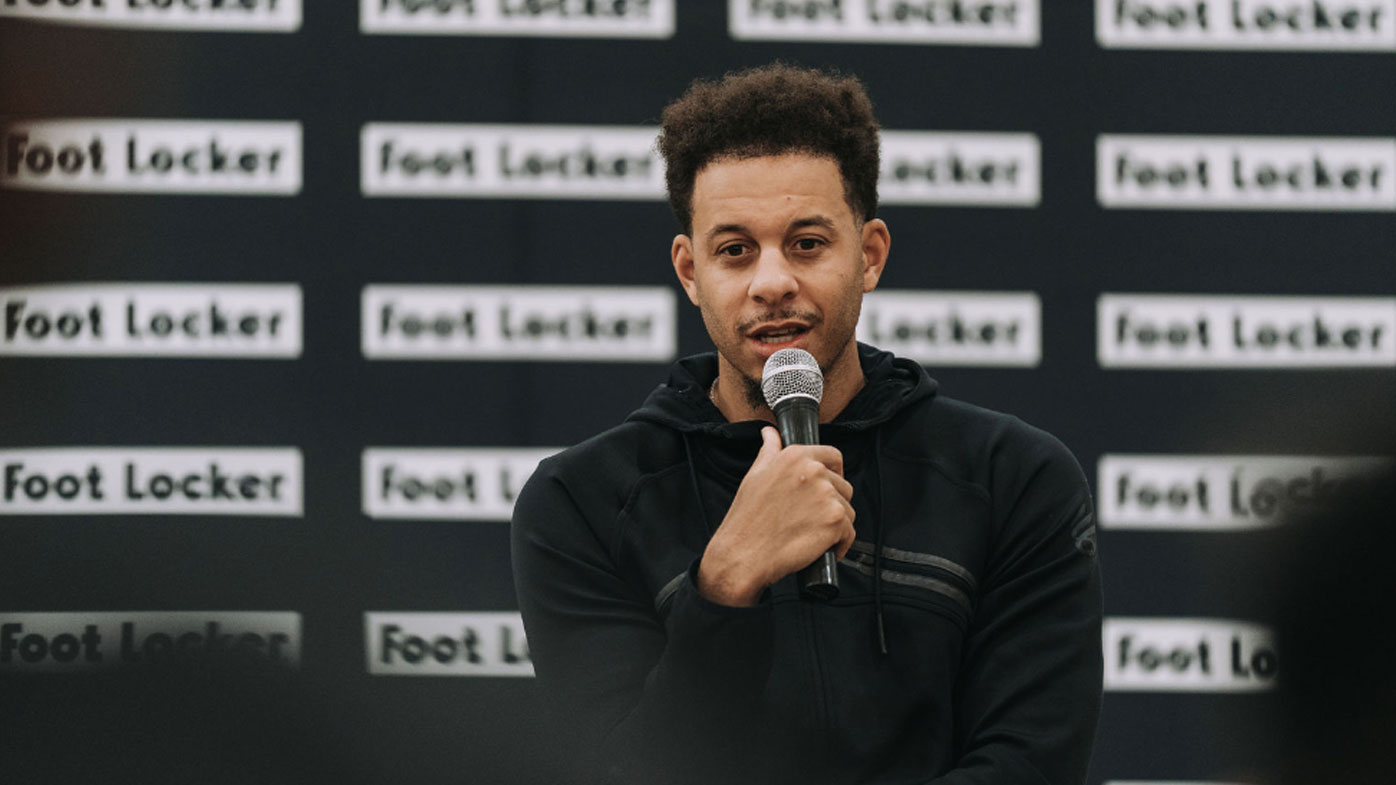 Seth Curry during basketball clinic with kids in Australia