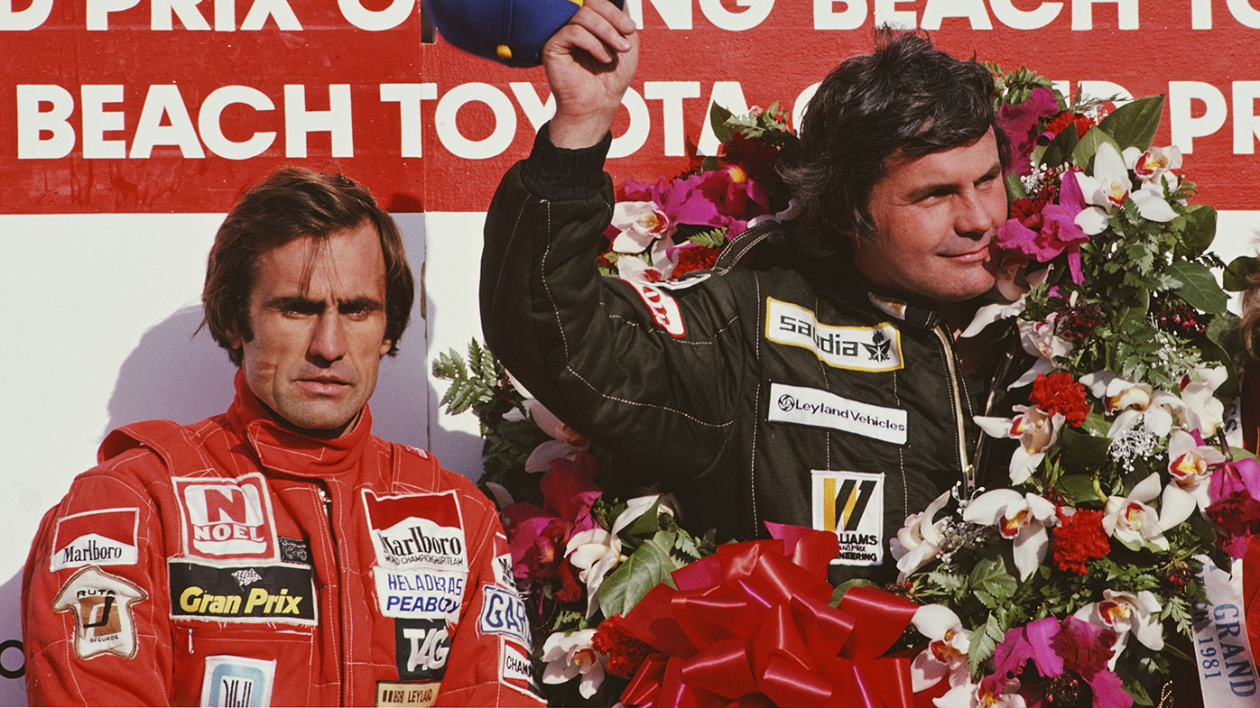 Alan Jones (right) celebrates his win at the 1981 US Grand Prix in Long Beach, ahead of teammate Carlos Reutemann.