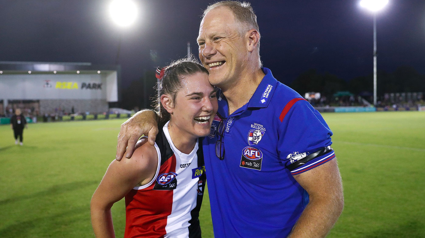 Nathan Burke, Head Coach of the Bulldogs and daughter Alice Burke of the Saints embrace after the 2021 AFLW Round 01 match between the St Kilda Saints and the Western Bulldogs at RSEA Park on January 29, 2021 in Melbourne, Australia.