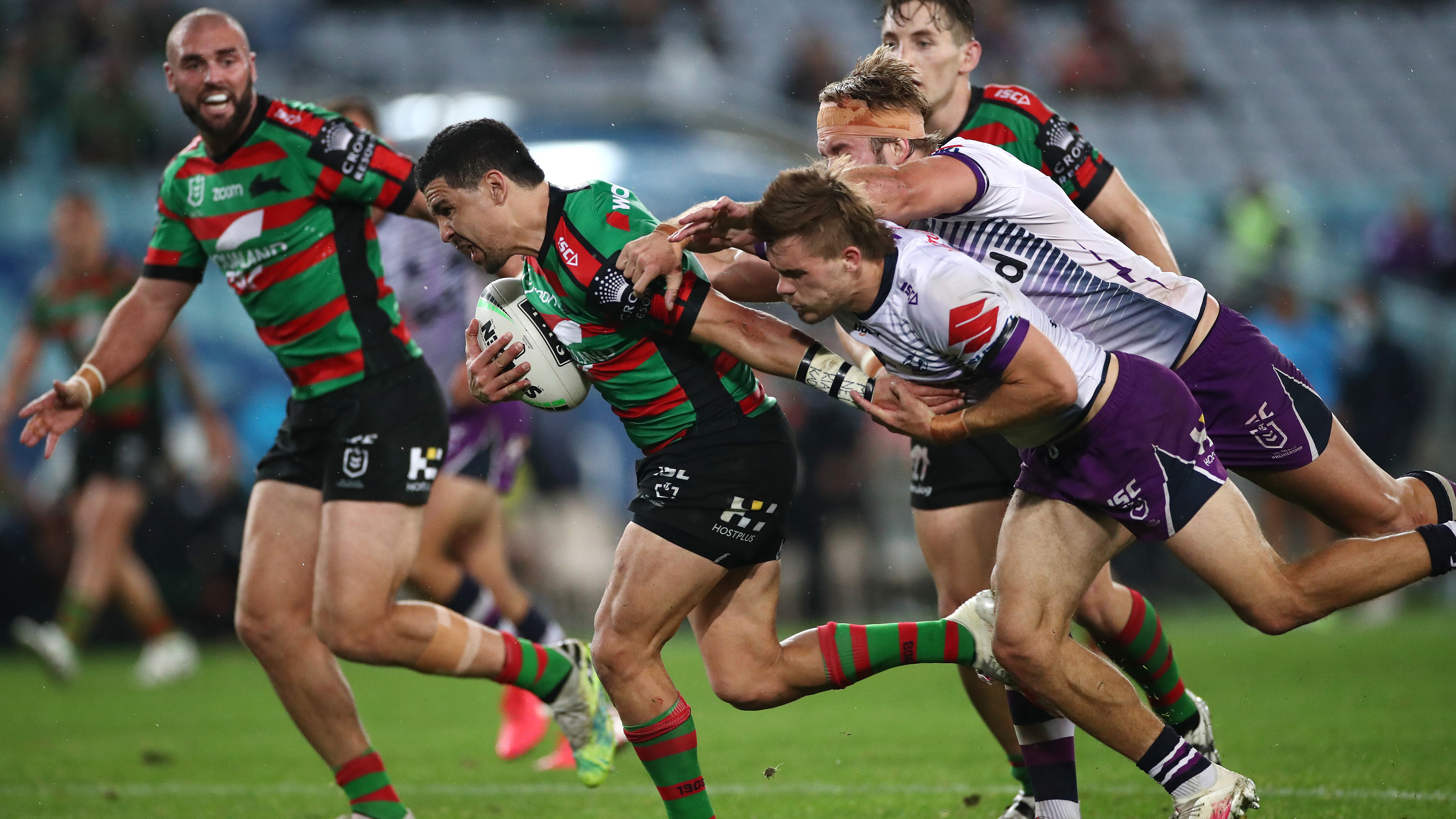 Cody Walker is chased down by Ryan Papenhuyzen.