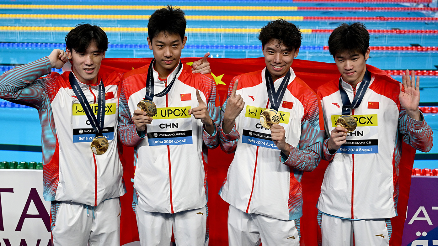 Gold Medalists, Zhanle Pan, Xinjie Ji, Zhanshuo Zhang and Haoyu Wang of Team People's Republic of China pose with their medals during the Medal Ceremony after the Men's 4x100m Freestyle Final on day ten of the Doha 2024 World Aquatics Championships at Aspire Dome on February 11, 2024 in Doha, Qatar. (Photo by Quinn Rooney/Getty Images)