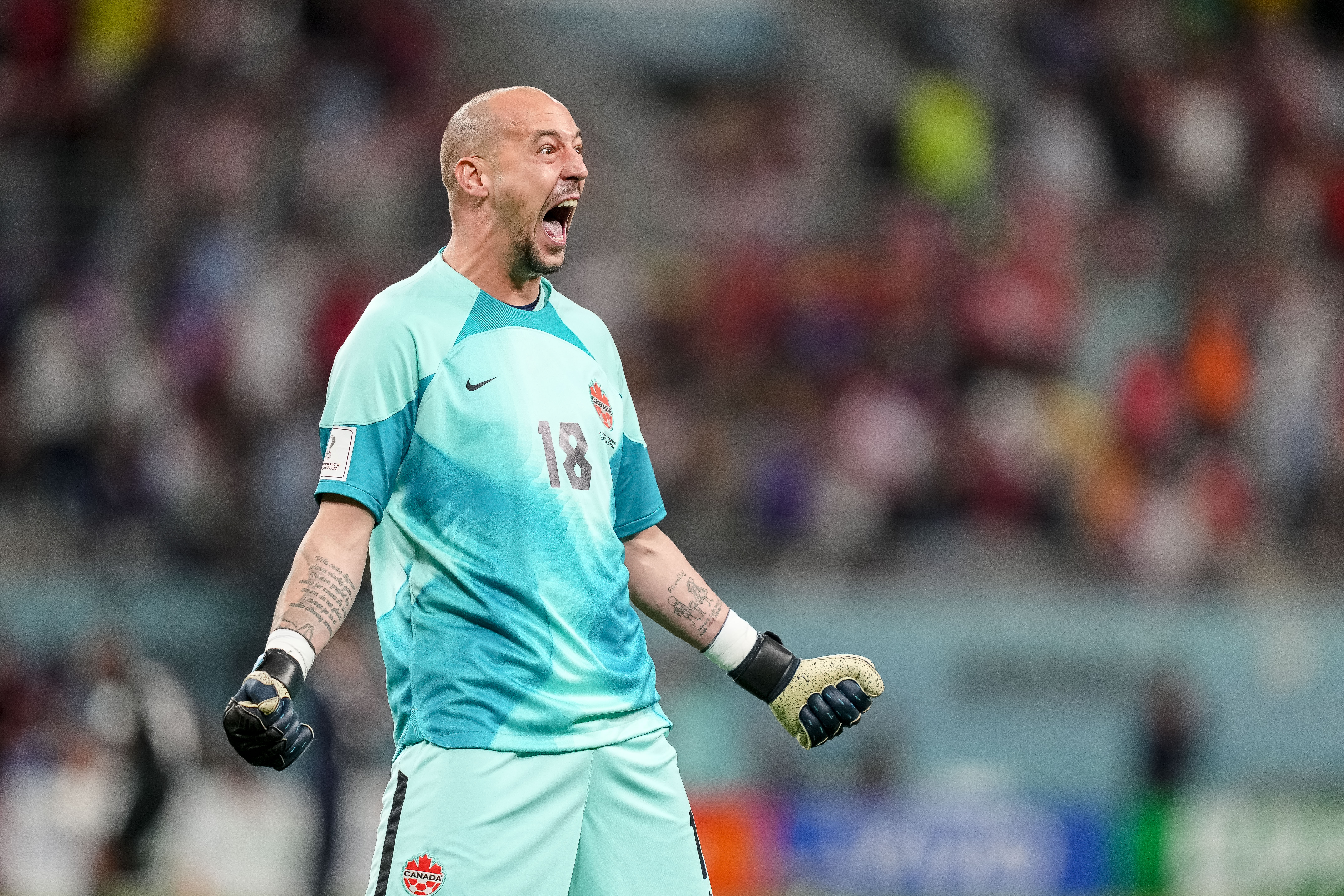 DOHA, QATAR - NOVEMBER 27: goalkeeper Milan Borjan of Canada celebrates after Alphonso Davies of Canada scores his teams first goal during the FIFA World Cup Qatar 2022 Group F match between Croatia and Canada at Khalifa International Stadium on November 27, 2022 in Doha, Qatar. (Photo by Mohammad Karamali/DeFodi Images via Getty Images)