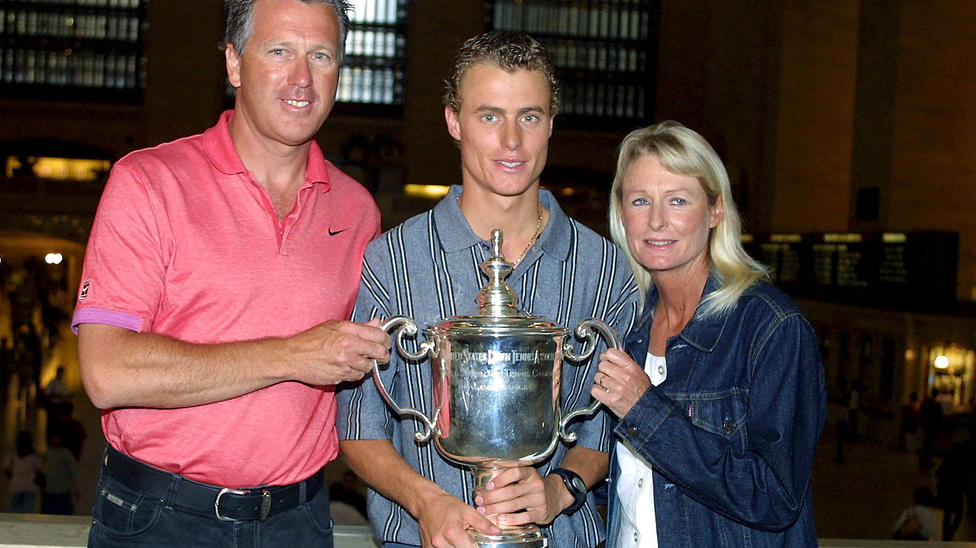 2001 US Open Champion Lleyton Hewitt with trophy, dad Glenn and mom Cheriilyn on the staircase at Grand Central Terminal