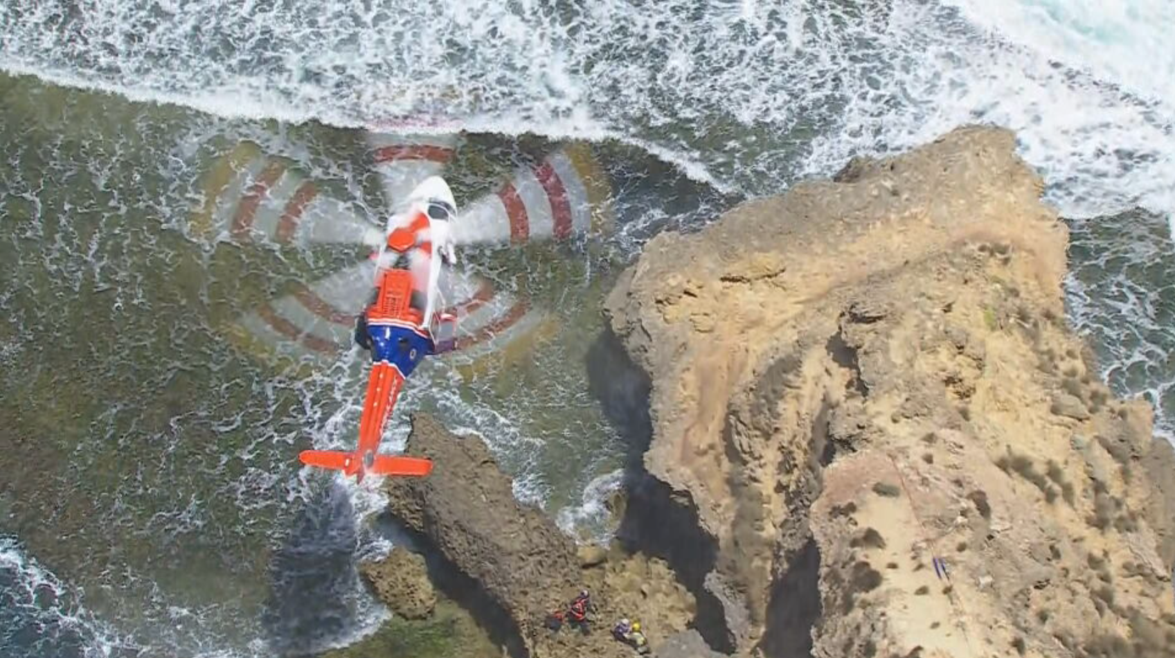 The teen was treated on the rocks for a non-life-threatening leg injury, before being winched from the scene.