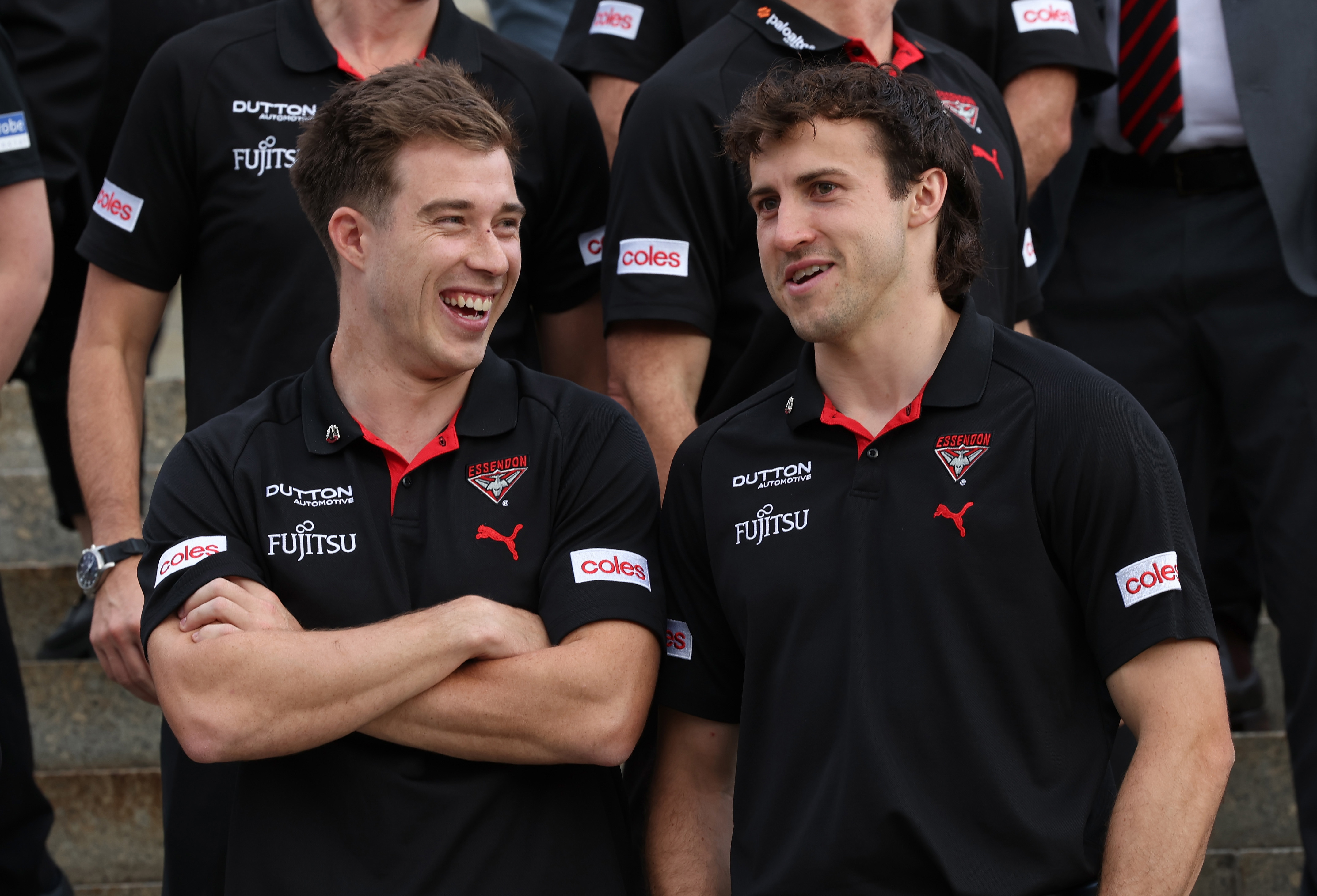 Zach Merrett and Andrew McGrath of the Bombers.