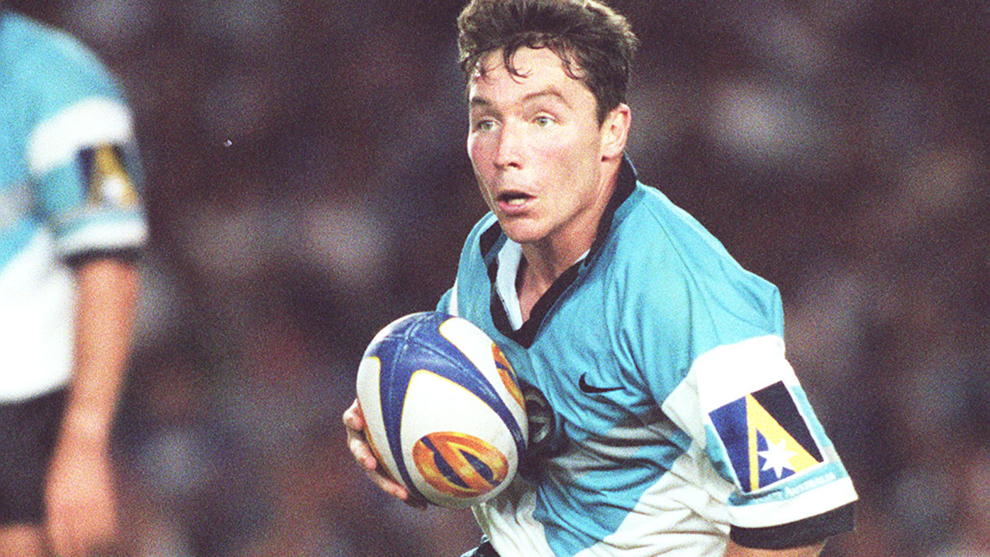 Paul Green running the ball for Cronulla in 1997.