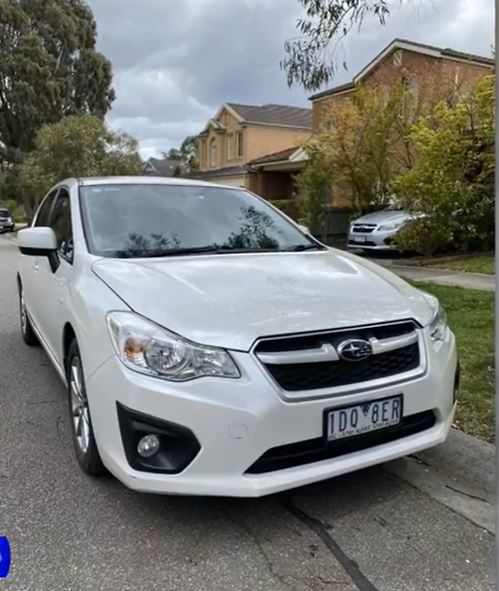 Stolen white Subaru