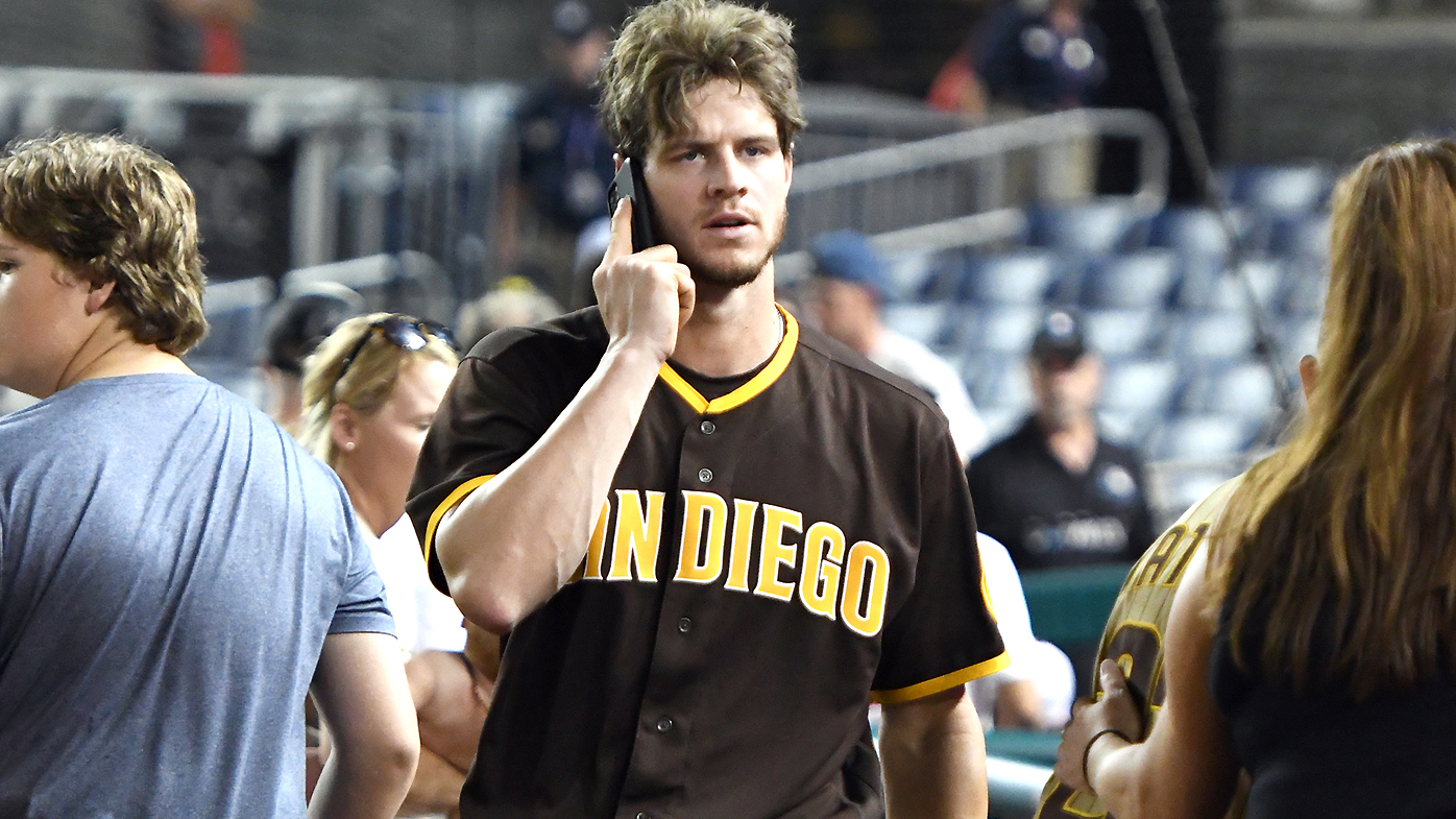 Wil Myers #5 of the San Diego Padres looks for family after what was believed to be shots were heard 