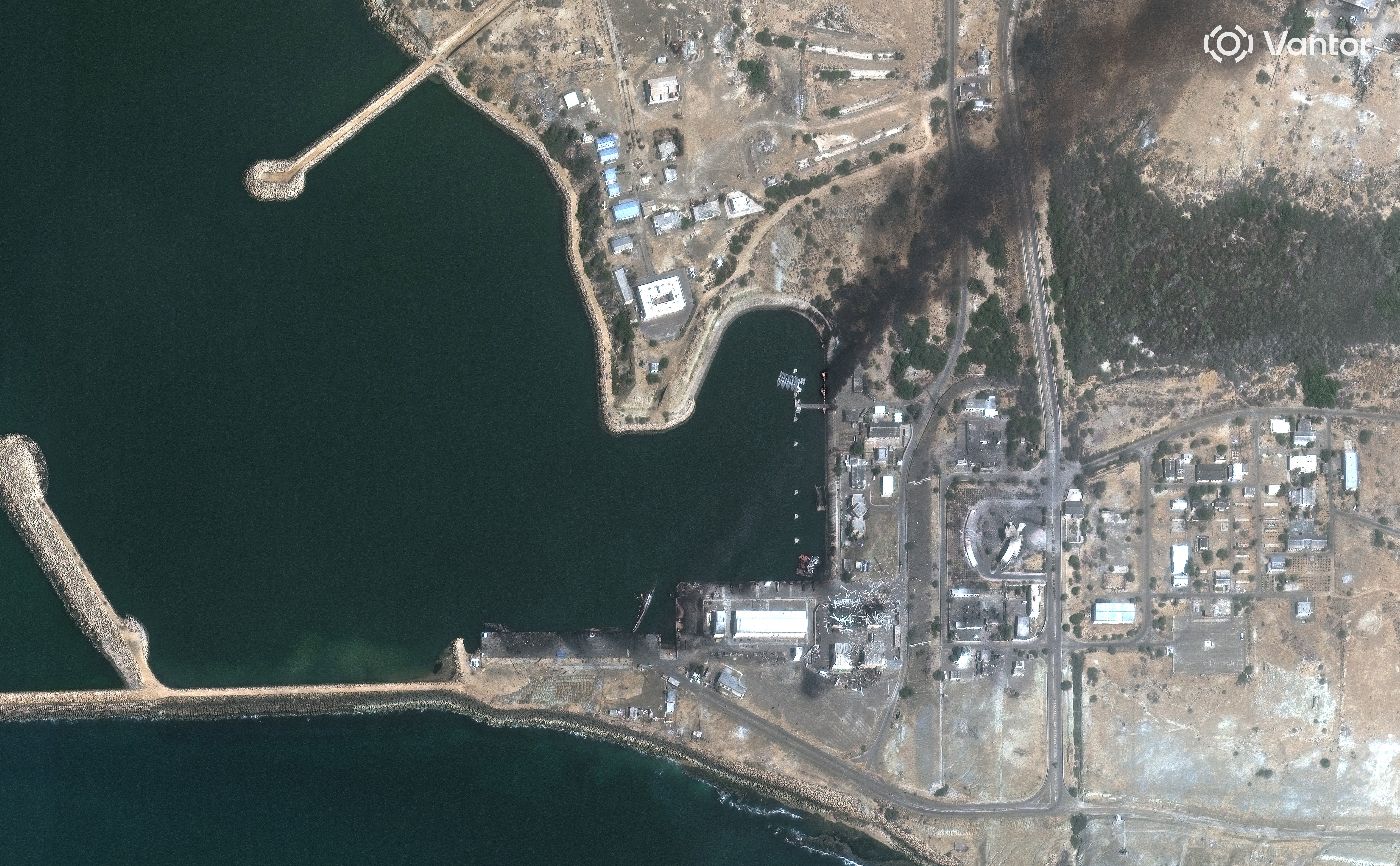 In this satellite image provided by Vantor, overview of destroyed vessels and facilities at the Konarak Naval Base, Iran, Sunday, March 1, 2026.  
