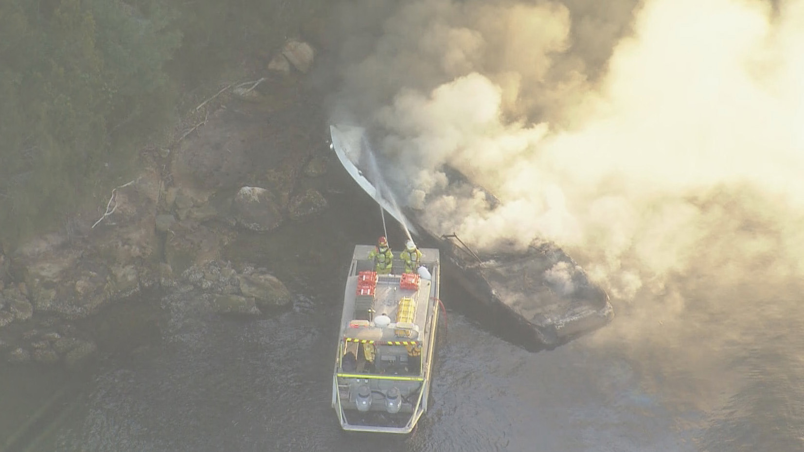 A man has been hurt in a boat fire in Sydney.
