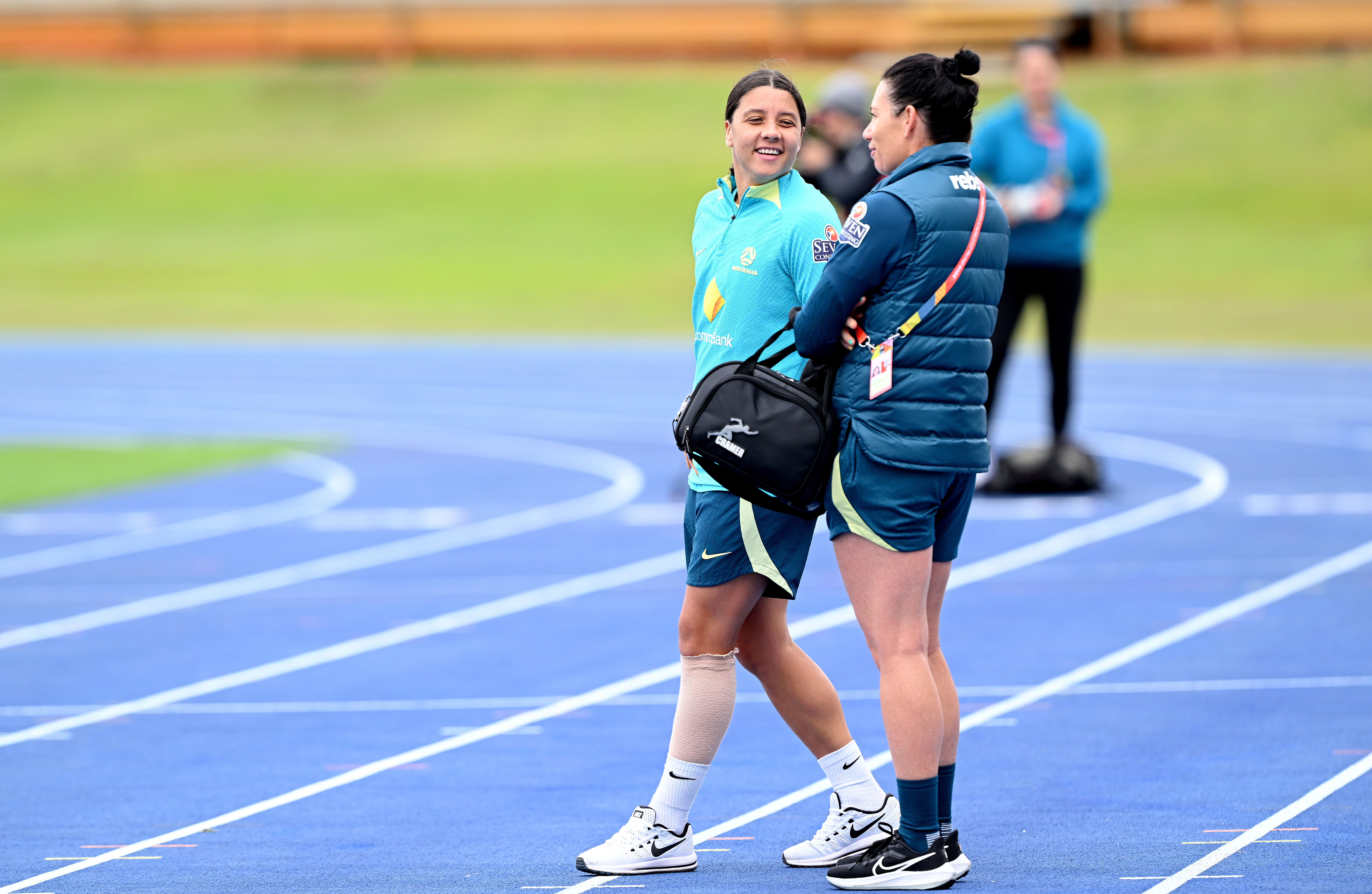 BRISBANE, AUSTRALIA - JULY 24: Sam Kerr is seen with bandaging on her injured left leg during an Australia Matildas open training session at the FIFA Women's World Cup Australia & New Zealand 2023 at Queensland Sport and Athletics Centre on July 24, 2023 in Brisbane, Australia. (Photo by Bradley Kanaris/Getty Images)