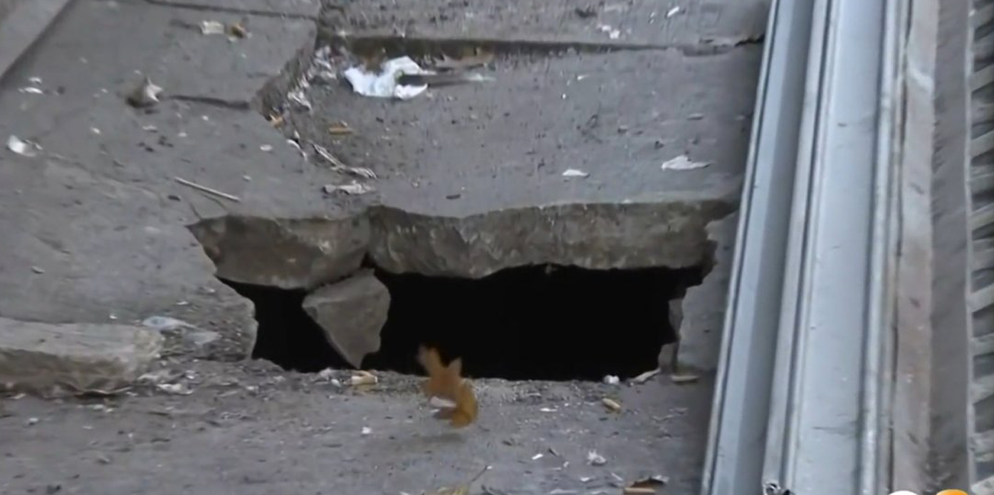 Witnesses in the Bronx, New York, say a man fell into a hole after the sidewalk he was standing on suddenly gave way.