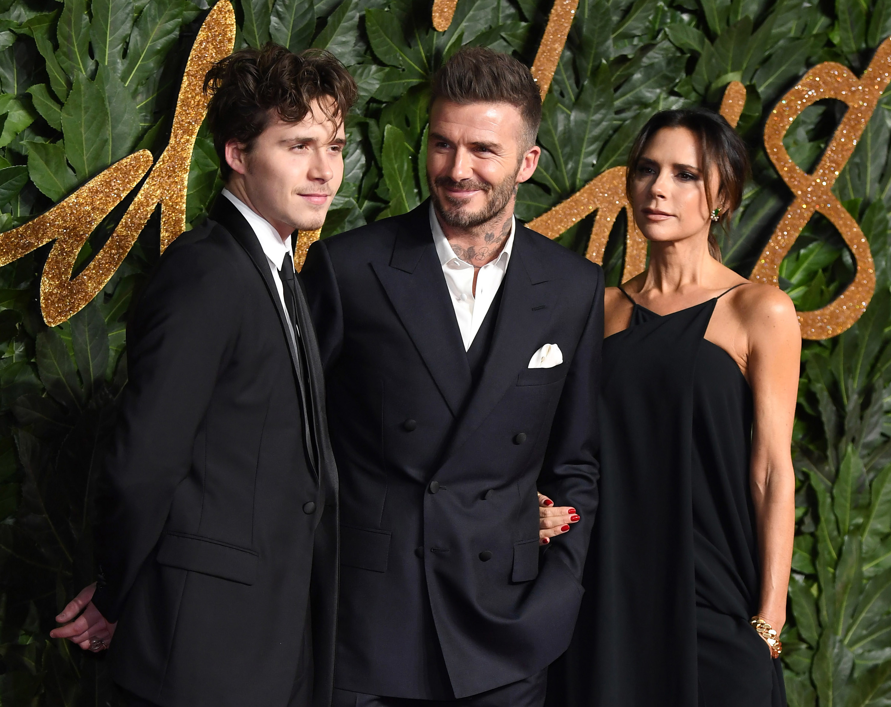 Brooklyn Beckham, David Beckham and Victoria Beckham 