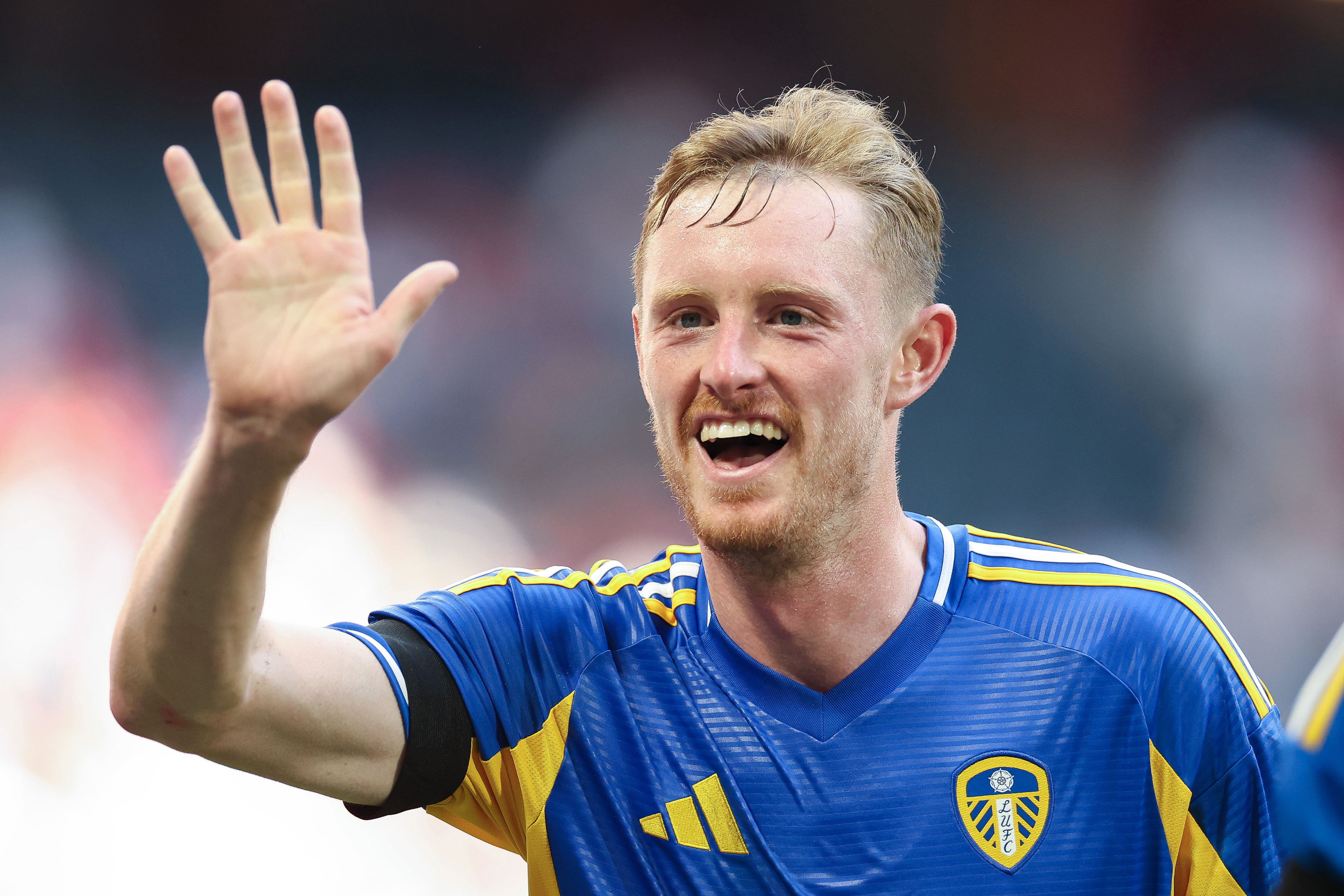 SOLNA, SWEDEN - JULY 19: Sean Longstaff of Leeds United acknowledges the fans after the pre-season friendly match between Manchester United and Leeds United at Strawberry Arena on July 19, 2025 in Solna, Sweden. (Photo by Linnea Rheborg/Getty Images)