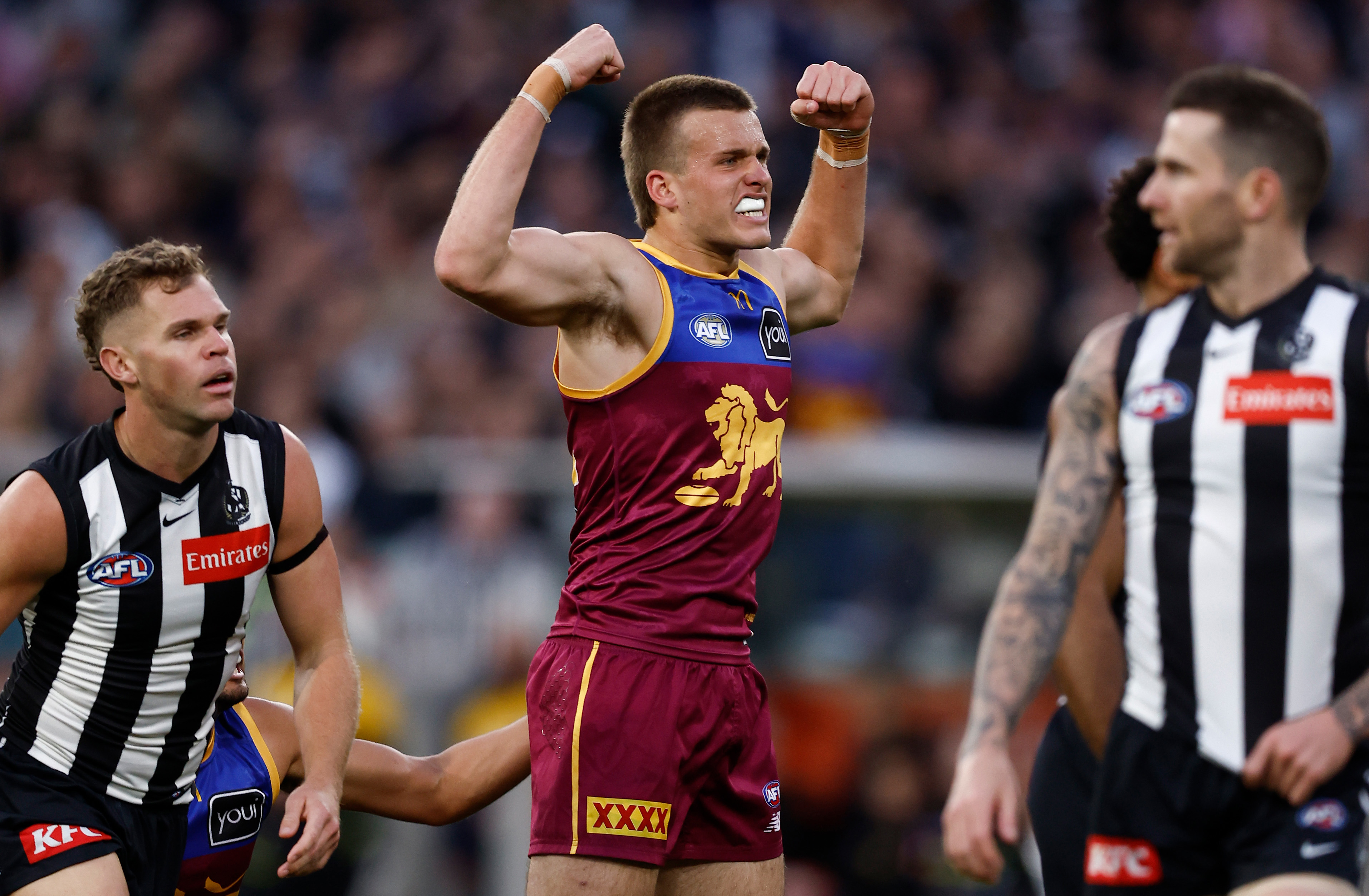 Ty Gallop of the Lions celebrates a goal